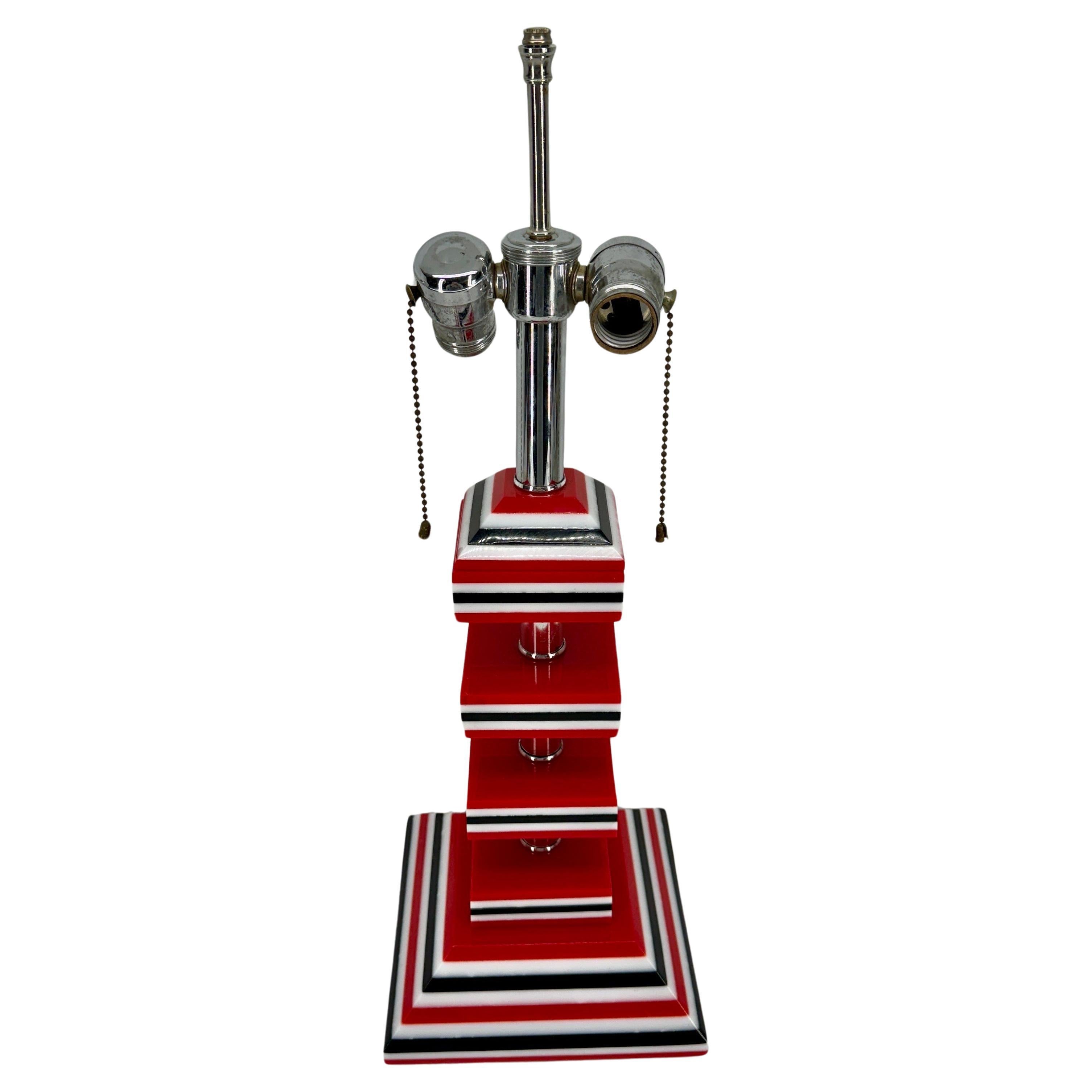 MId-Century Modern Italian 1970's table lamp in red, white and black lucite on square table lamp with chrome fittings.