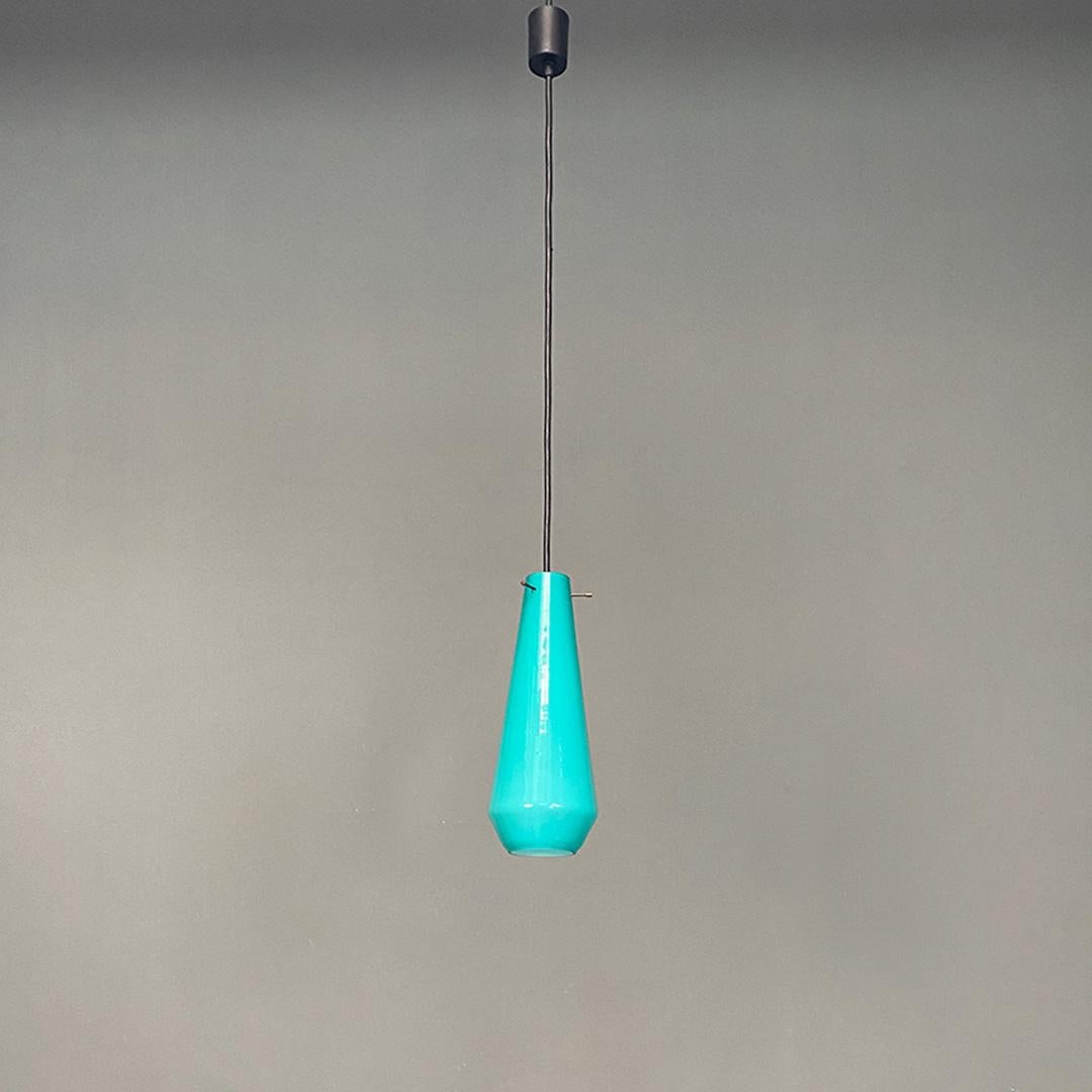 Italian Mid-Century Modern aquamarine and white double glass chandelier, 1960s.
Double glass chandelier, teal on the outside and white on the inside.
1960s
Perfect conditions.
Measurements in cm of the diffuser 14 x 45 H.
overall height in the