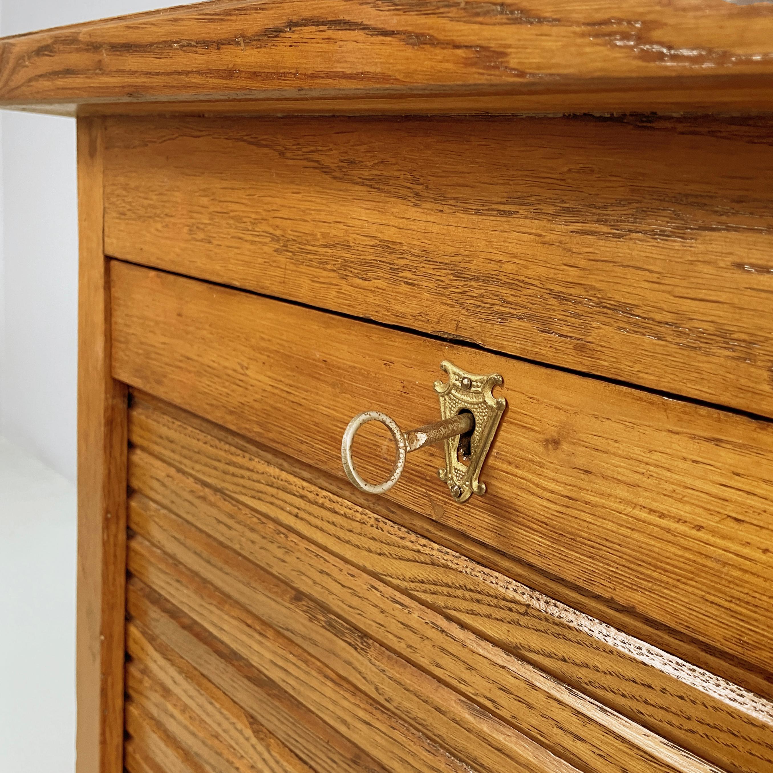 Italian mid-century modern archive cabinet with shutter opening in wood, 1940s For Sale 4