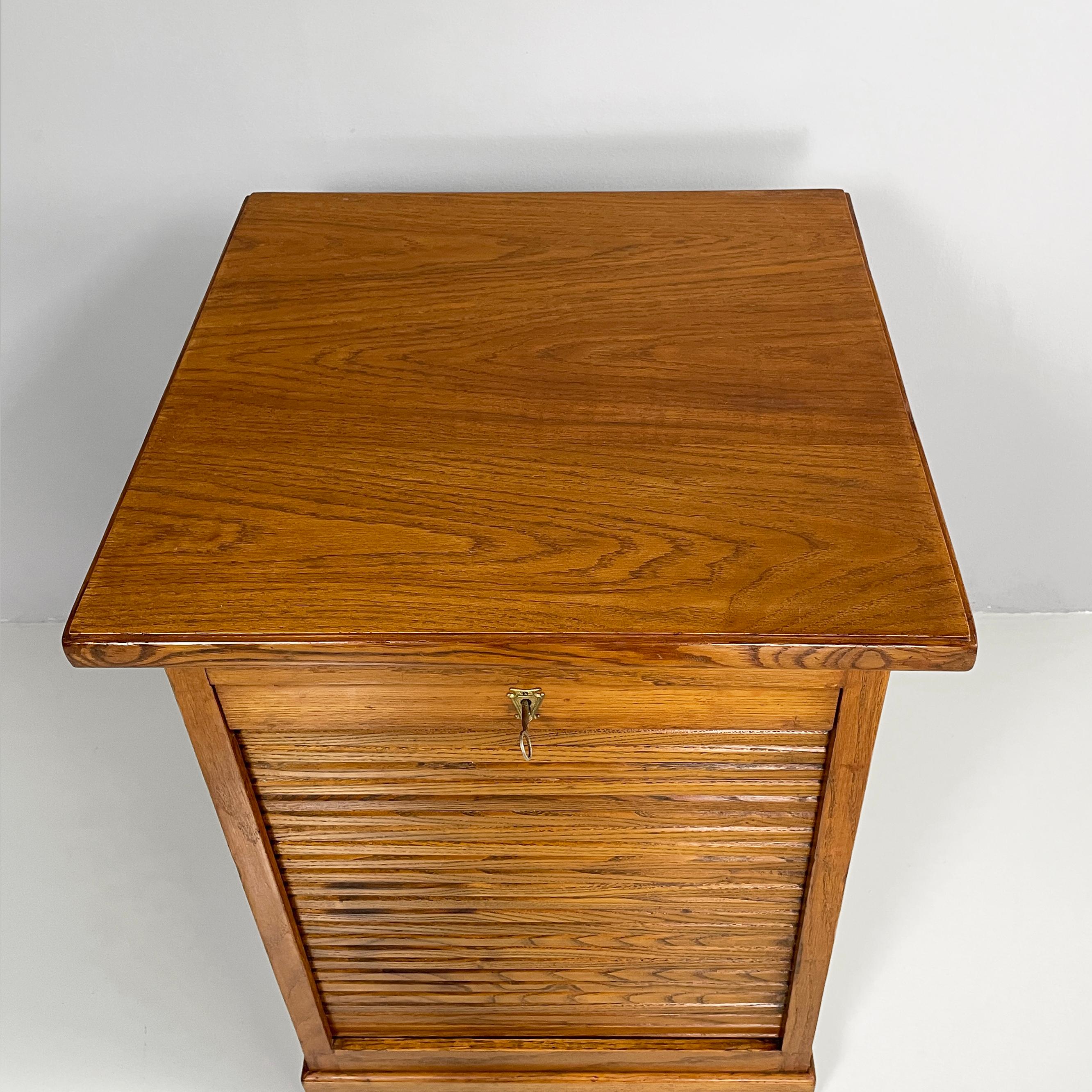 Wood Italian mid-century modern archive cabinet with shutter opening in wood, 1940s For Sale