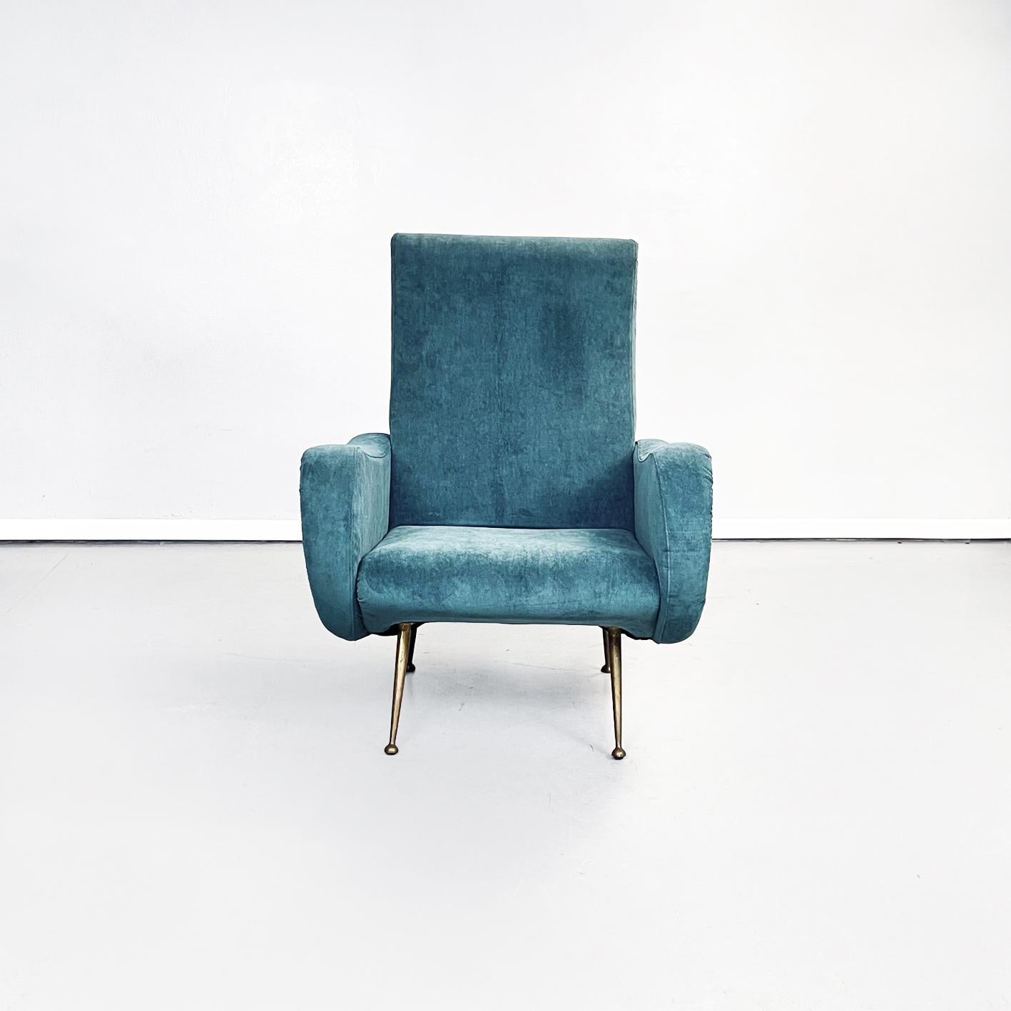Italian Mid-Century Modern armchair in blue fabric and brass feet, 1950s.
Armchair upholstered and covered in blue fabric. The back is slightly curved. Rounded armrests. Brass legs with round feet.
The armchair from 1950s period its a original piece