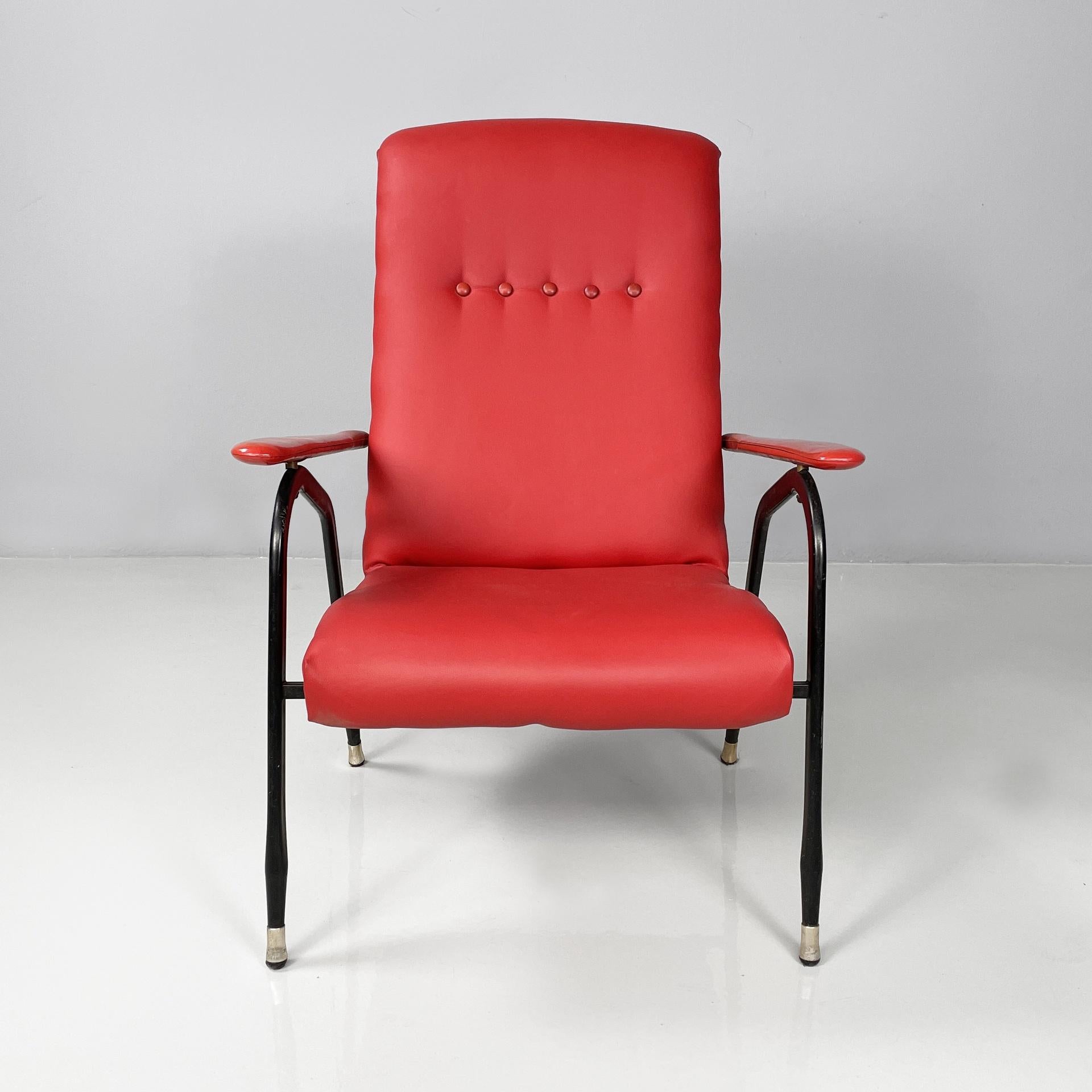 Italian mid-century modern armchair in red sky and black metal, 1960s
Armchair padded and upholstered in bright red sky with round metal studs. There are five red buttons in the center of the backrest. The shaped armrests are also padded and