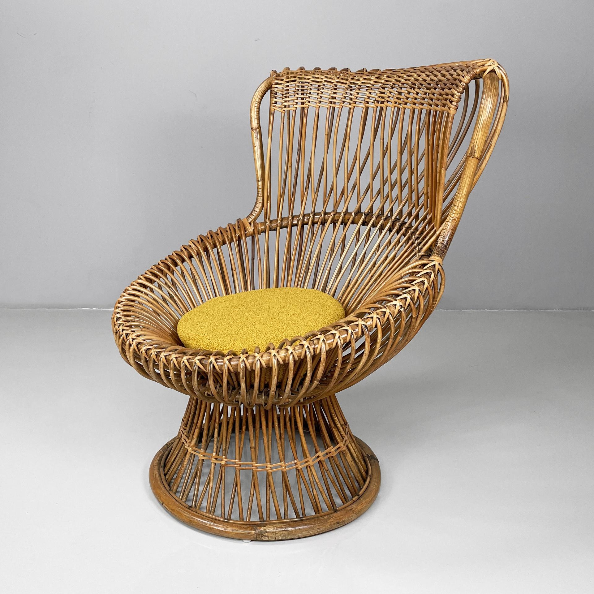 Italian mid-century modern armchair Margherita by Franco Albini for Bonacina, 1960s
Armchair model Margherita with backrest and seat made of curved and woven rattan. At the centre of the seat there is a round cushion in bright yellow fabric. The