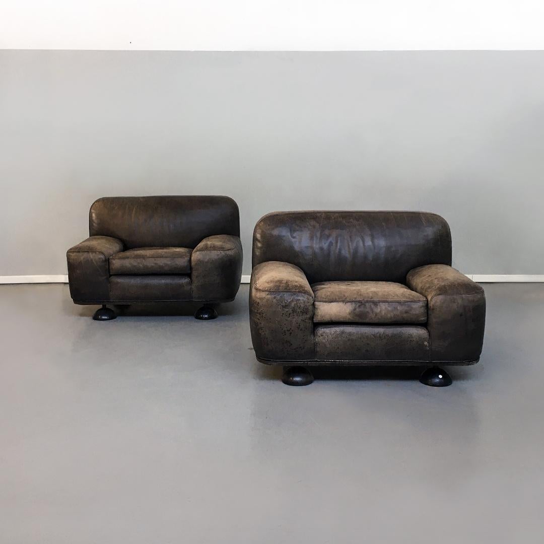 Italian Mid-Century Modern armchairs Altopiano by Franco Poli for Bernini, 1970s
Two armchairs Altopiano, upholstered in their original gray leather: fully upholstered, with wooden legs in a hemisphere with slightly lighter leather on one of the