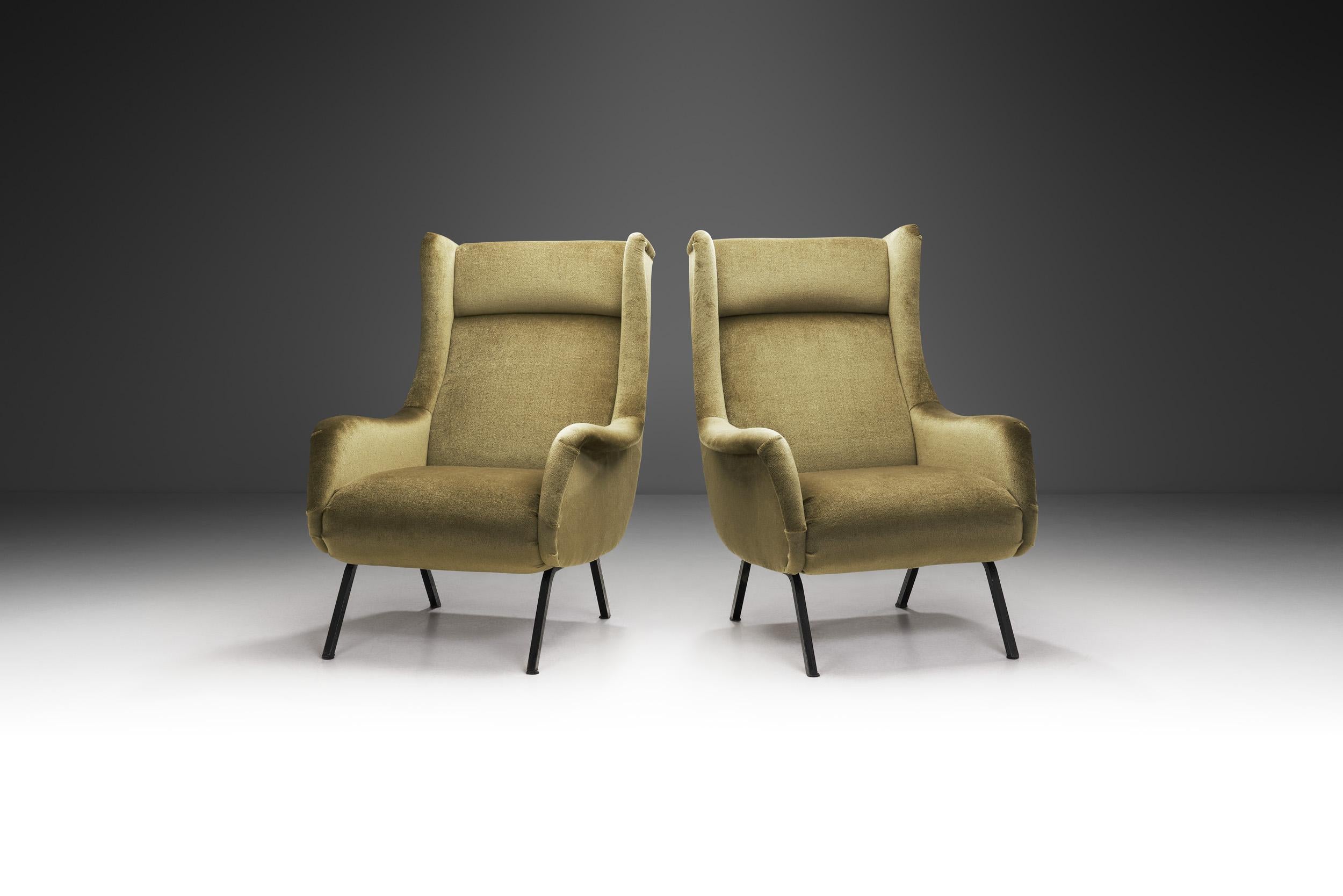 In the bustling design landscape of 1960s Italy, this pair of elegant yet striking armchairs embody the aesthetic innovation that defined the era. Crafted in the 1960s, these chairs seamlessly blend form and function, showcasing a mastery of design