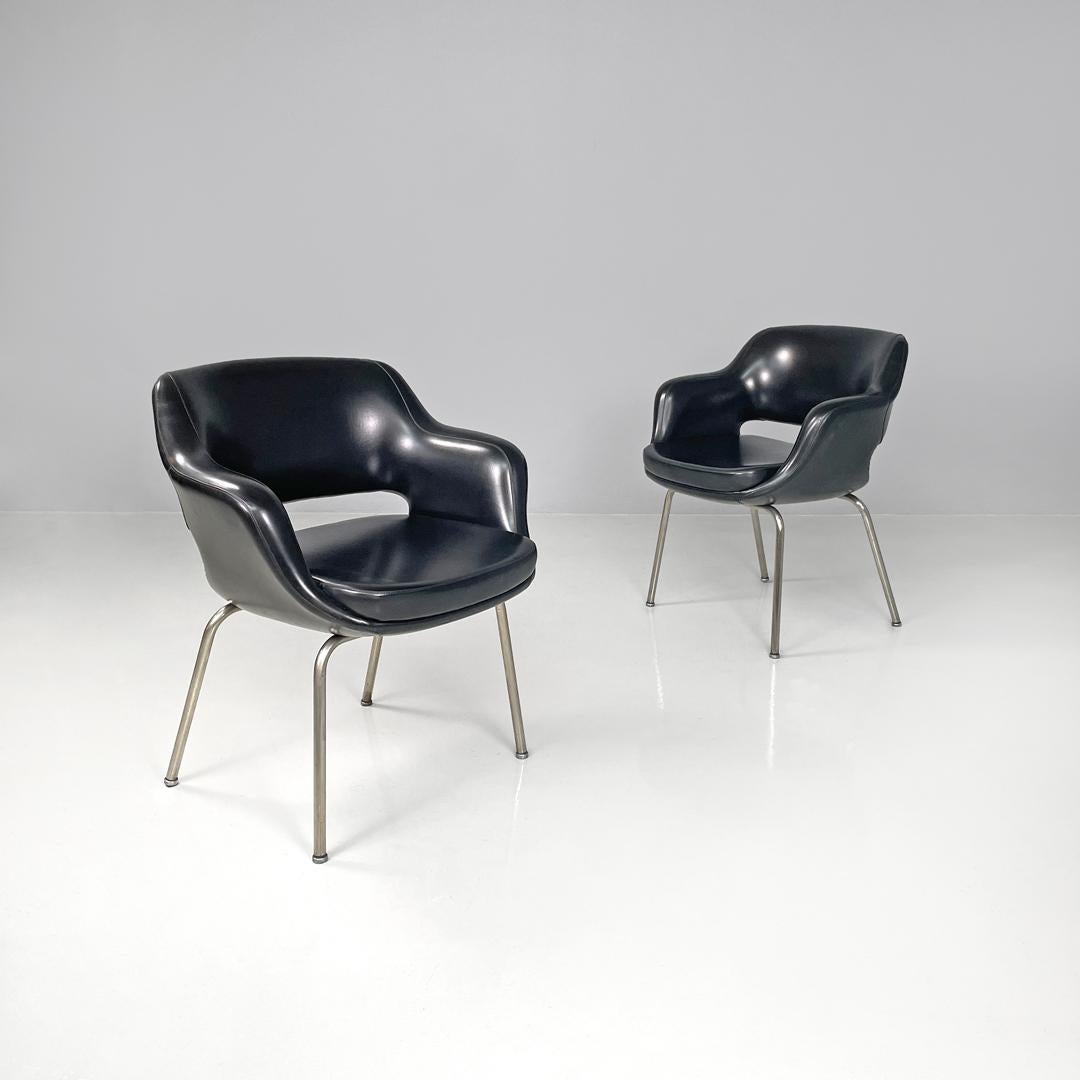 Italian mid-century modern armchairs Kilta by Olli Mannermaa for Cassina, 1960s
Pair of armchairs mod. Kilta with armrests, for office or desk, padded and covered in black leather. The backrest and armrests follow curved and rounded lines. With a