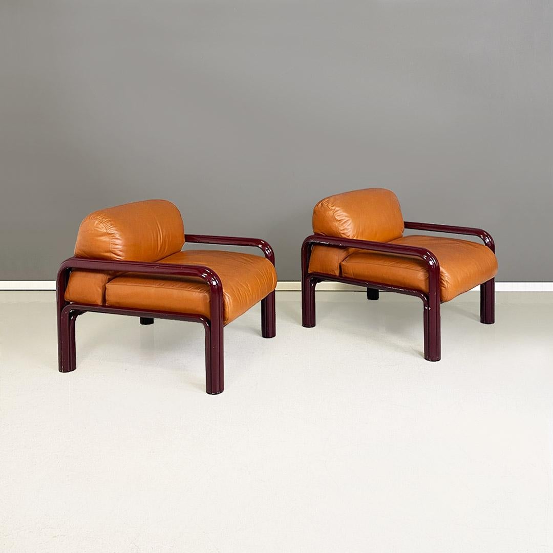 Italian Mid-Century Modern armchairs mod. 54-S1 by Gae Aulenti for Knoll, 1977
Beautiful, elegant and very comfortable pair of armchairs mod. 54-S1 with burgundy painted metal structure and cognac leather upholstery.
Design by Gae Aulenti for Knoll