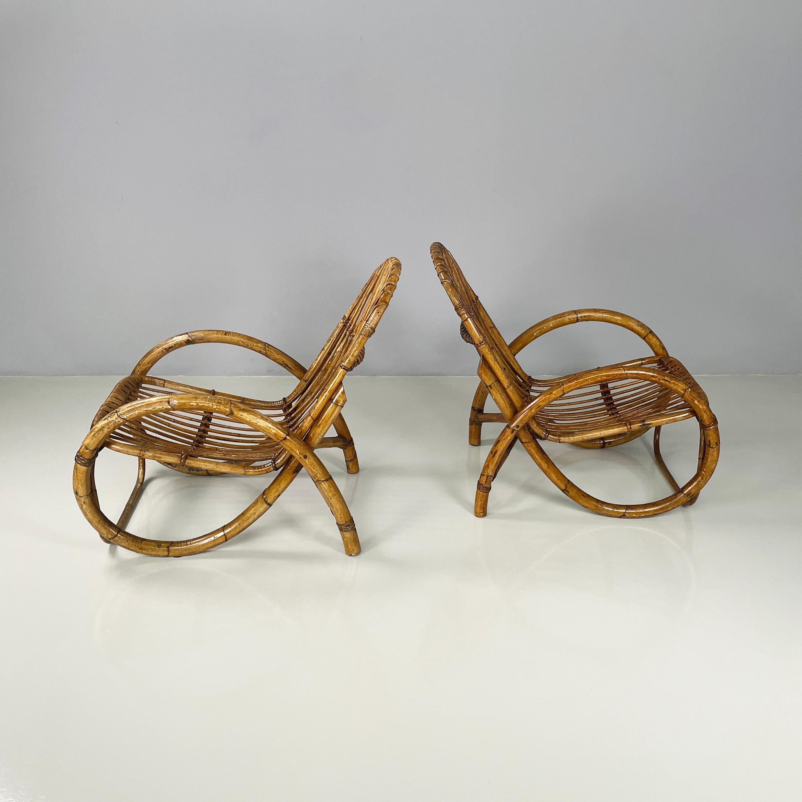 Mid-Century Modern Italian mid-century modern Armchairs with armrests in curved rattan, 1960s For Sale