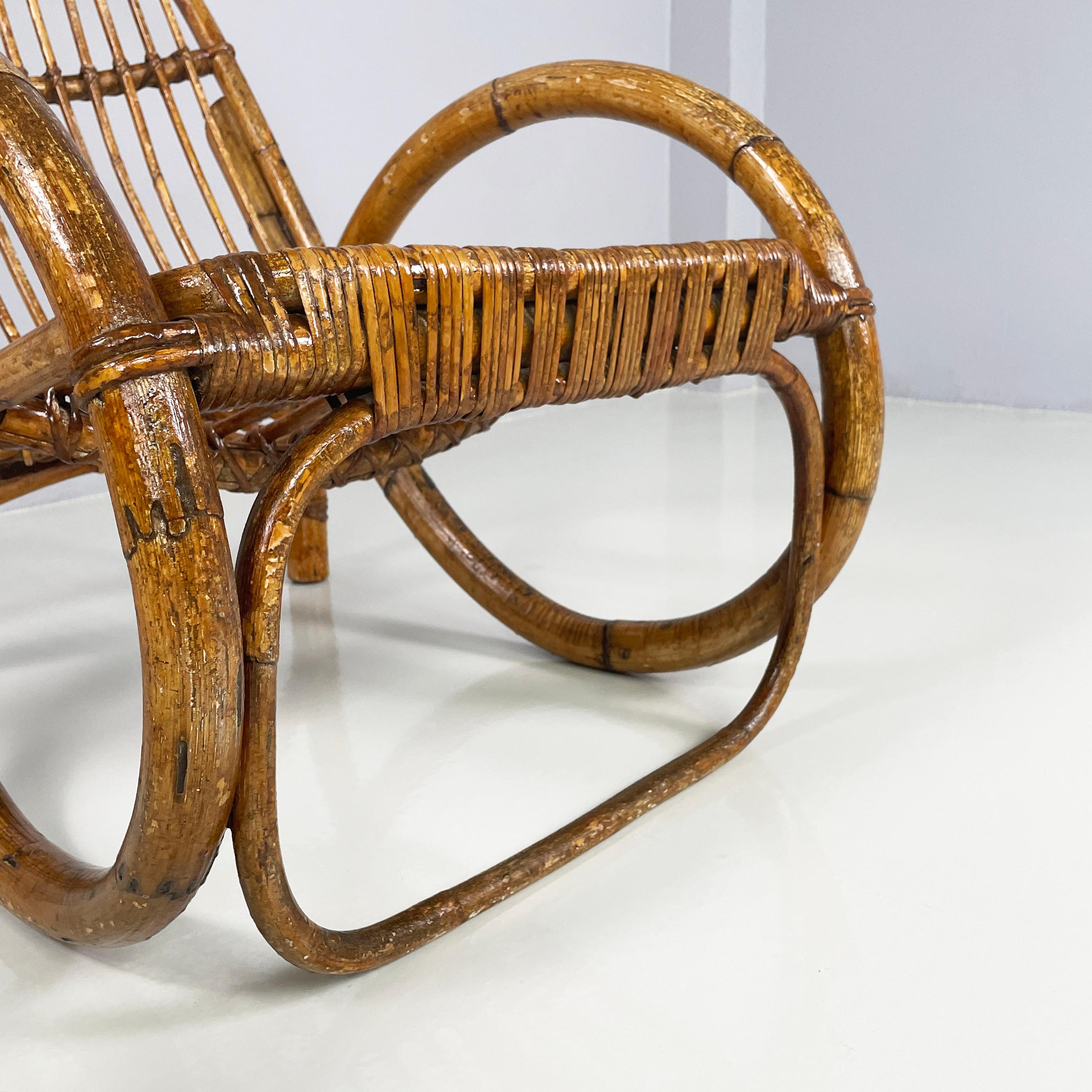 Rattan Italian mid-century modern Armchairs with armrests in curved rattan, 1960s For Sale