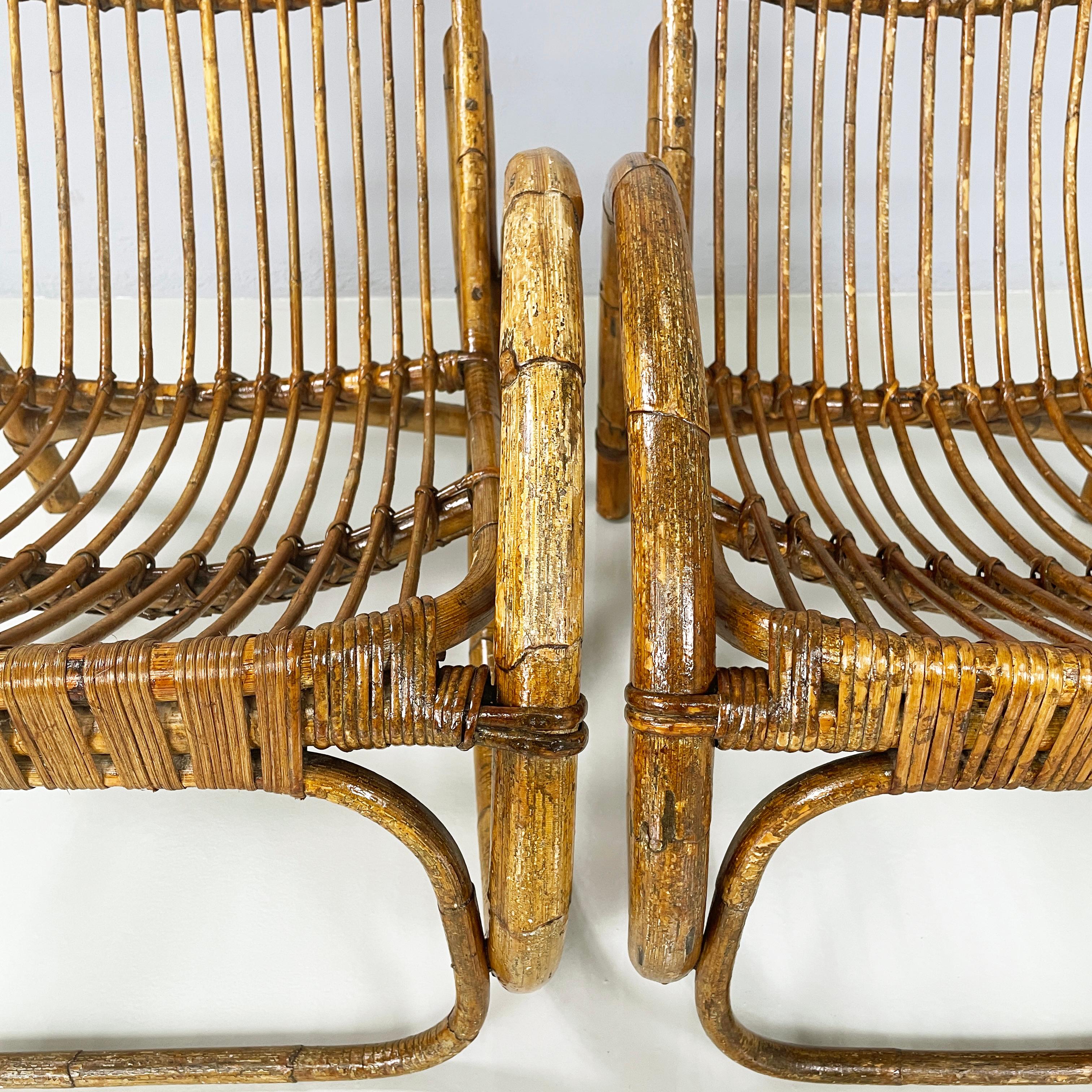 Italian mid-century modern Armchairs with armrests in curved rattan, 1960s For Sale 1