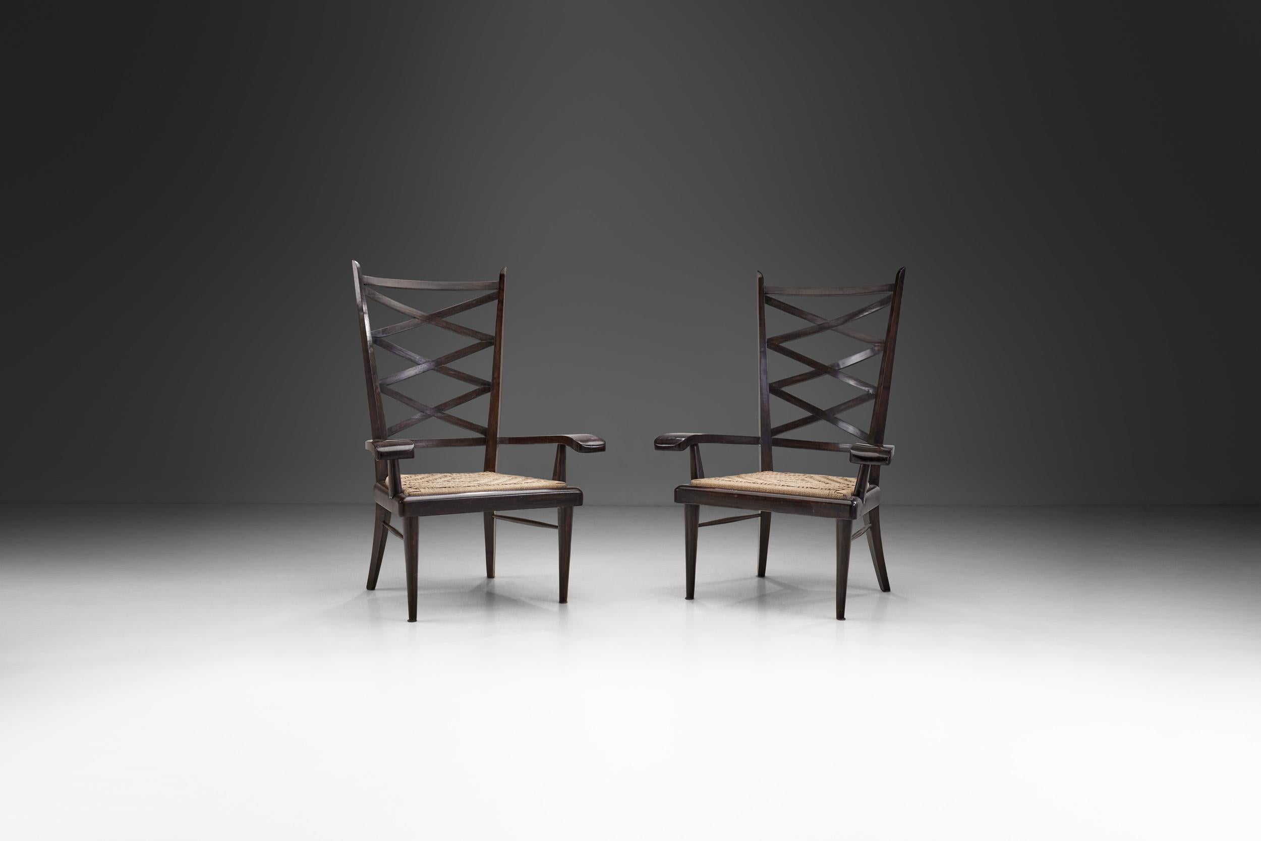 This pair of armchairs stands as evidence why Italian design looked back to organic forms during the 1970s. While many early 1970s furniture designs took cues from the Art Deco shapes and forms, a more understated style also became desired bringing