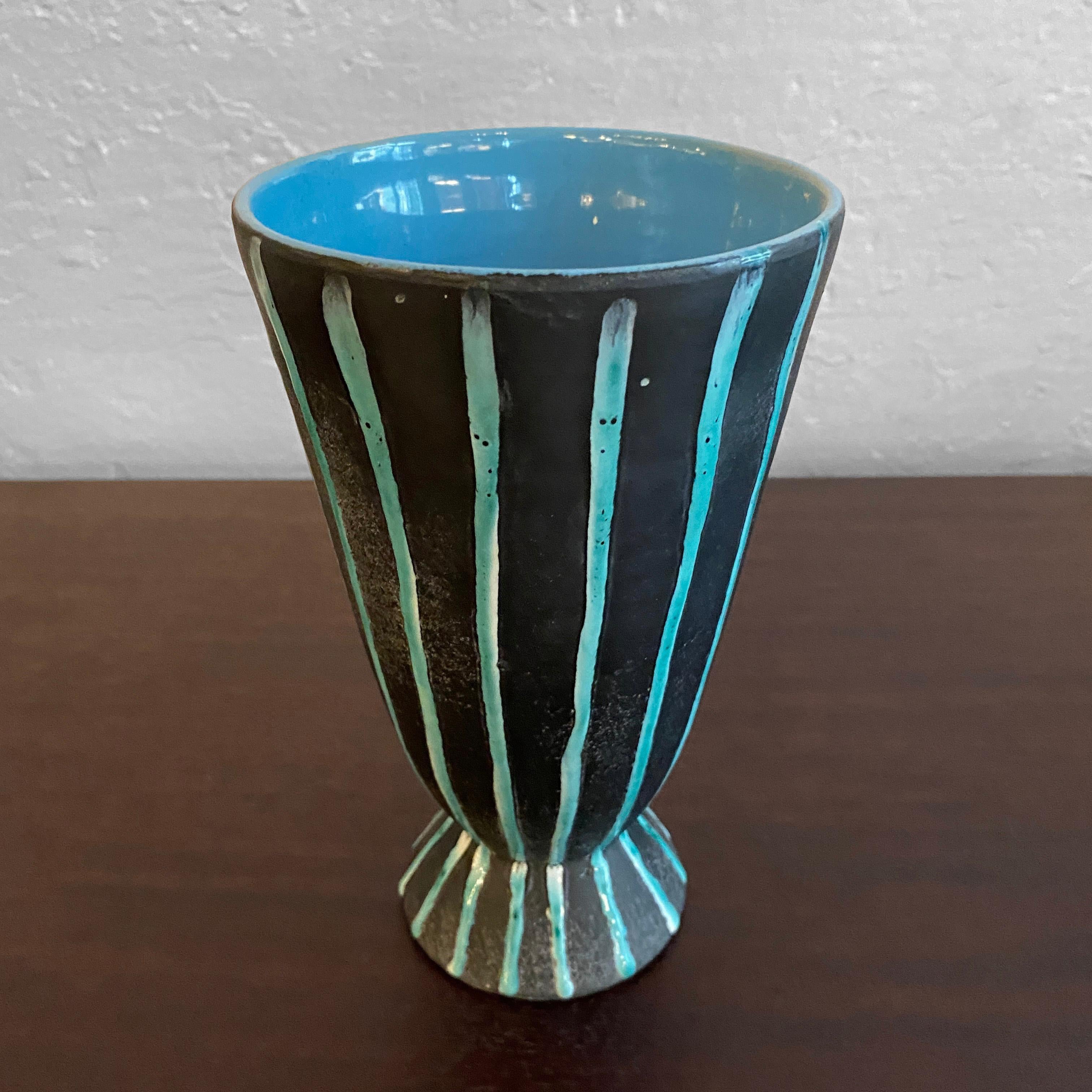 Italian, Mid-Century Modern, art pottery vase by Paul's Of Italy features a chalis shaped body with striking, black and blue stripe, matte glaze. Interior is blue.