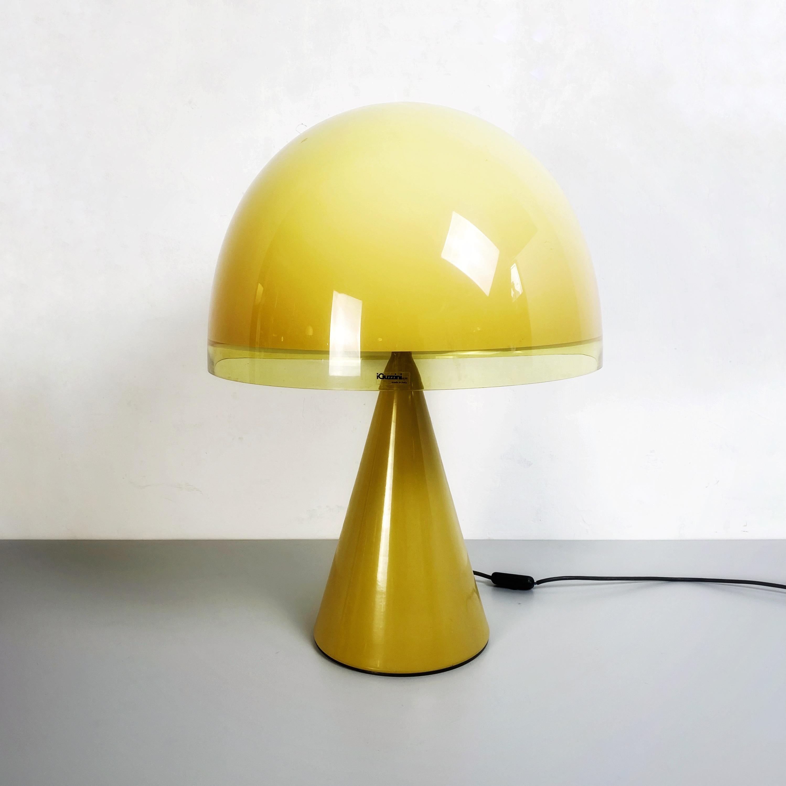 Italian mid-century modern Baobab 4044 table lamp by iGuzzini, 1980s
Baobab 4044 table lamp with conical base in ocher yellow metal painted and ocher yellow acrylic mushroom lampshade.
This small version was in production until 1992, the model