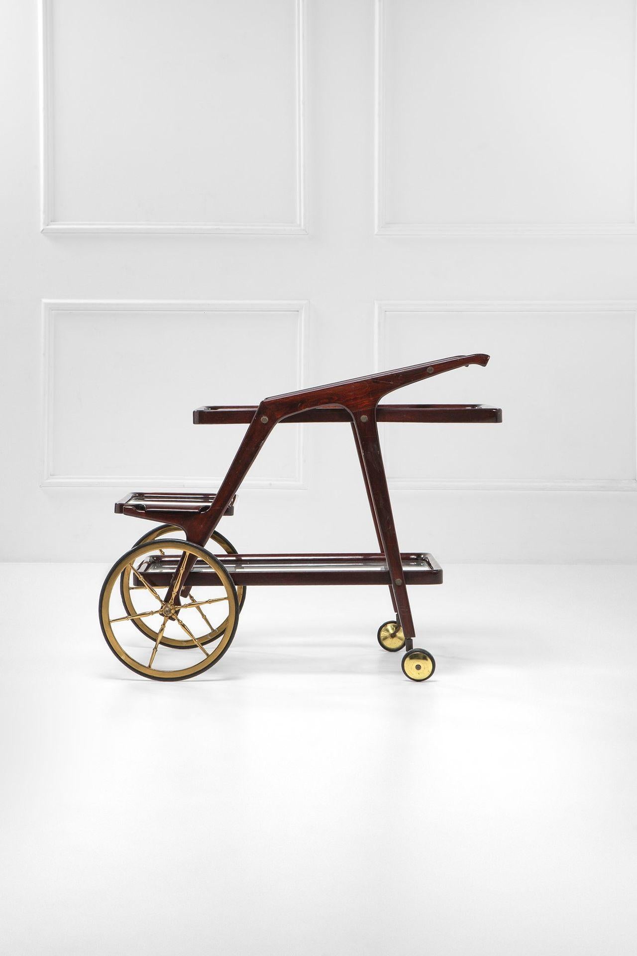 A stunning and rare Italian bar cart attributed to Cesare Lacca, one of the most celebrated designers of the mid-20th century. Crafted around 1950, this elegant serving trolley exemplifies the refined sophistication and innovative craftsmanship of