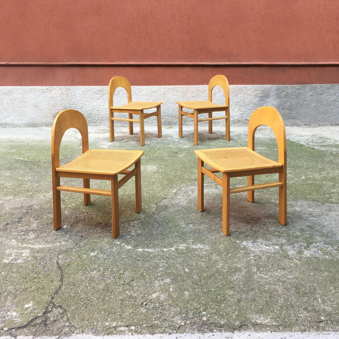 Italian Mid-Century Modern beech chairs with Vienna straw, 1980s
Set of four chairs with beech frame, curved plywood backrest, Vienna straw seat and rectangular section legs, 1980s

Good condition, well preserved Vienna straw.

Measures: 45 x
