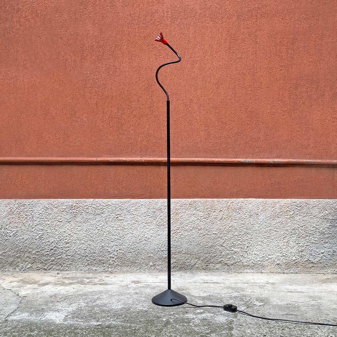 Italian Mid-Century Modern black and red metal floor lamp by Tronconi, 1980s
black floor lamp with structure and base in black metal, articulated in the upper part and red lampshade with dichroic bulb. Produced by Tronconi.

Very good