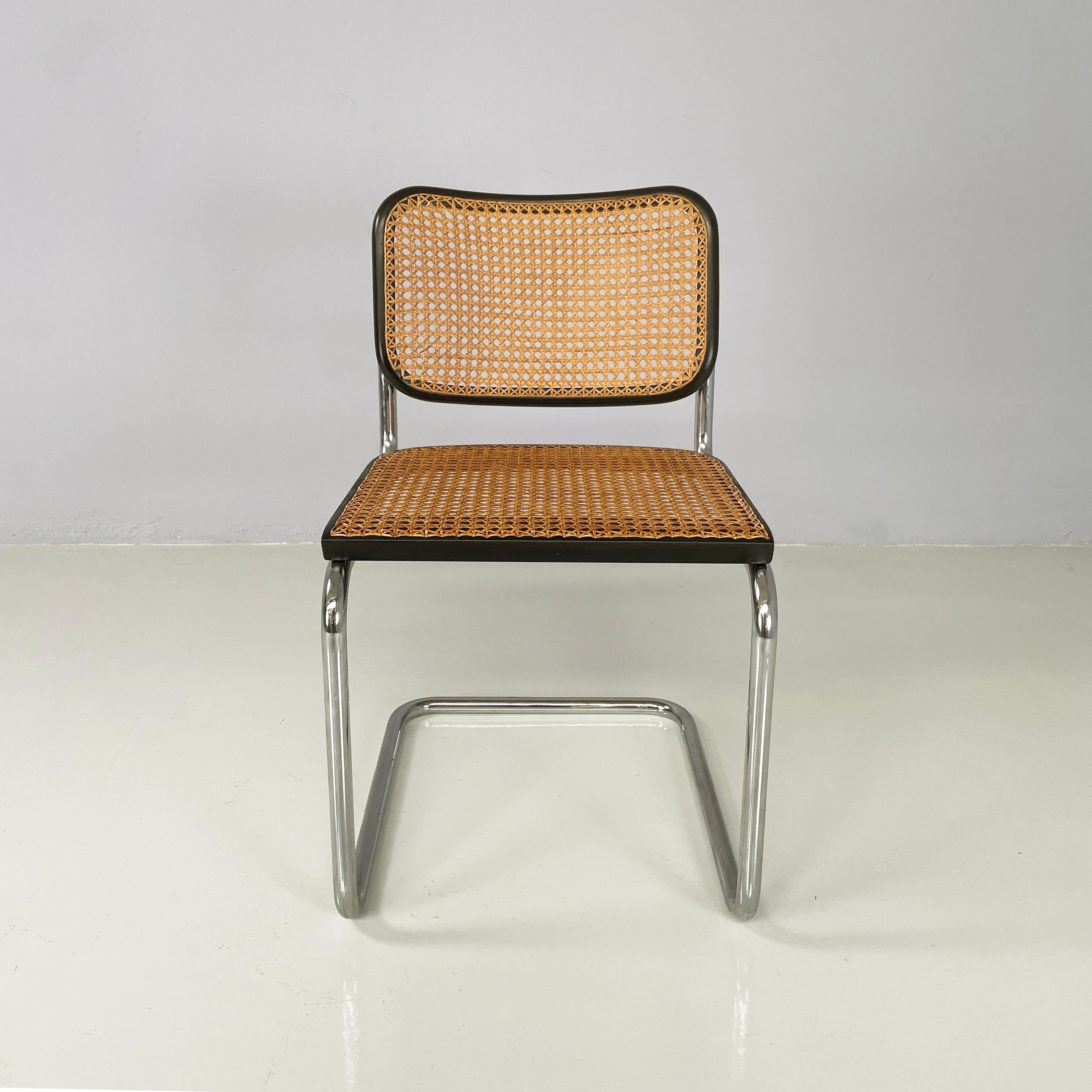 Italian mid-century modern Black Chair Cesca by Marcel Breuer for Gavina, 1960s
Chair mod. Cesca  with seat and backrest in dark Vienna straw and black painted wooden profiles. The structure is in curved tubular steel.
Produced by Gavina in 1960s