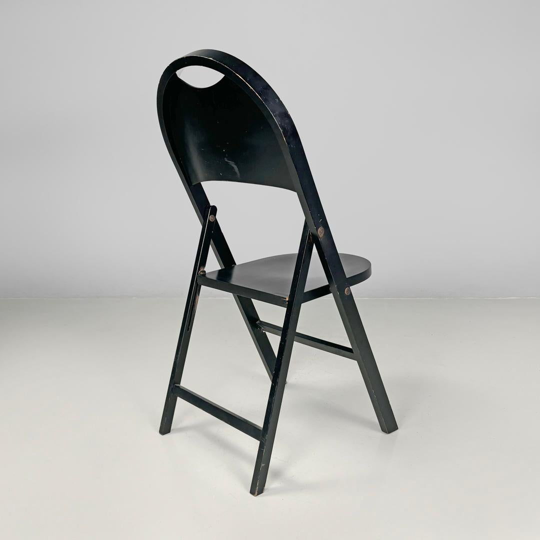 Italian mid-century modern black folding chair Tric Castiglioni BBB, 1960s In Fair Condition For Sale In MIlano, IT