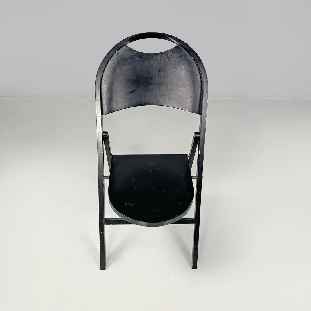 Metal Italian mid-century modern black folding chair Tric Castiglioni BBB, 1960s For Sale