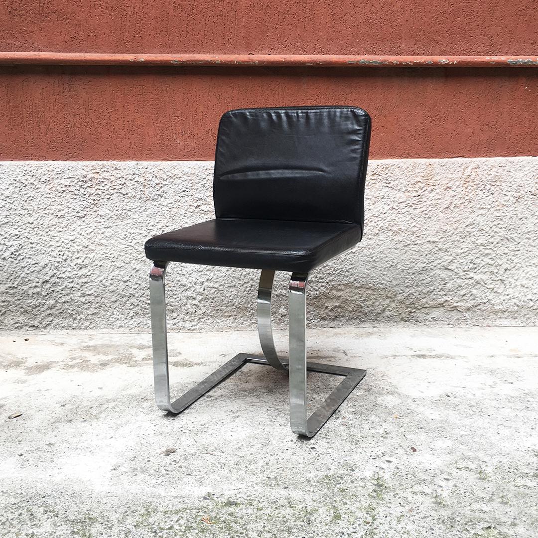 Italian Mid-Century Modern black leather chair with chromed structure, 1970s
Black leather chair with padded seat and back upholstered in black leather and curved, chromed steel structure made in a single piece, 1970s

Very good