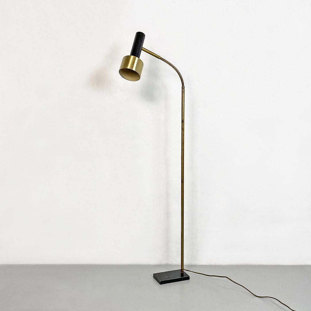 Italian Mid-Century Modern brass and metal adjustable floor lamp by Stilux, 1960s
Floor lamp with rectangular metal base, brass stem with flexible end part that allows you to orient the black and golden metal lampshade.
Produced by Stilux around