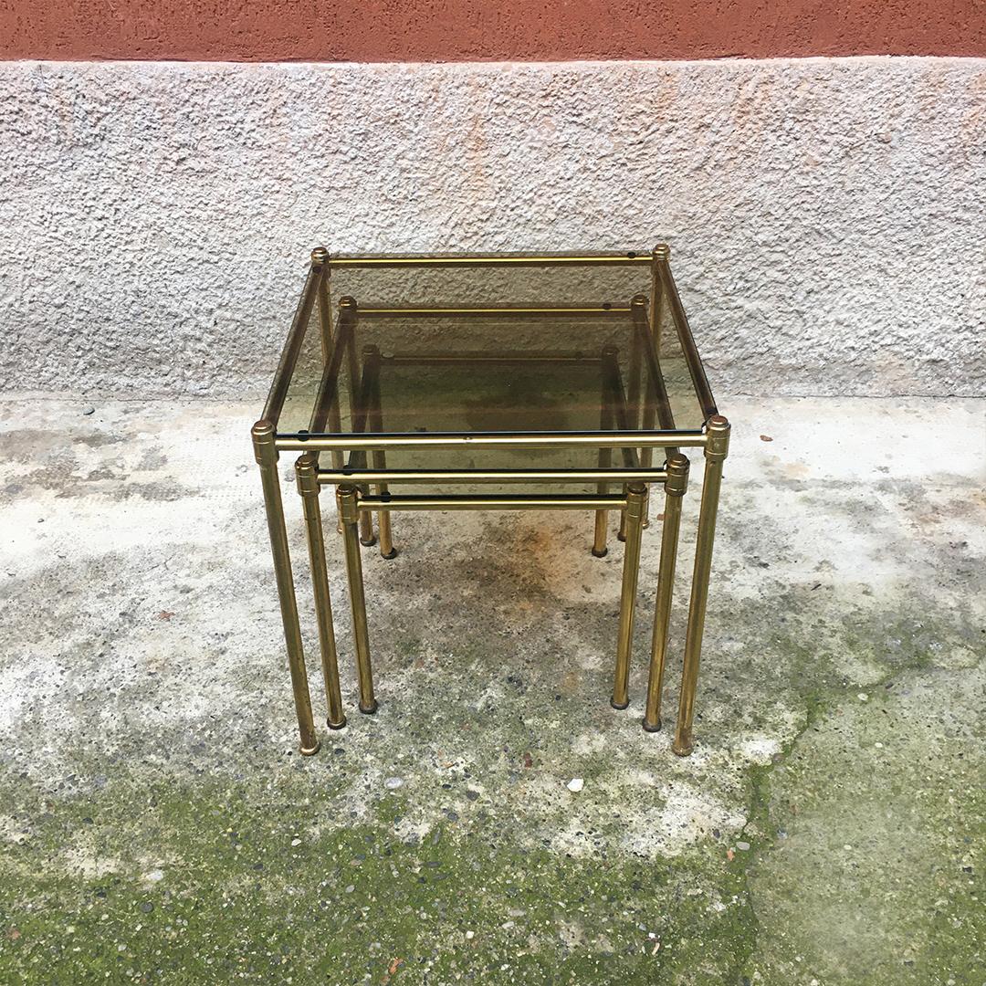 Late 20th Century Italian Mid-Century Modern Brass and Smoked Glass Trio of coffee Tables, 1970s