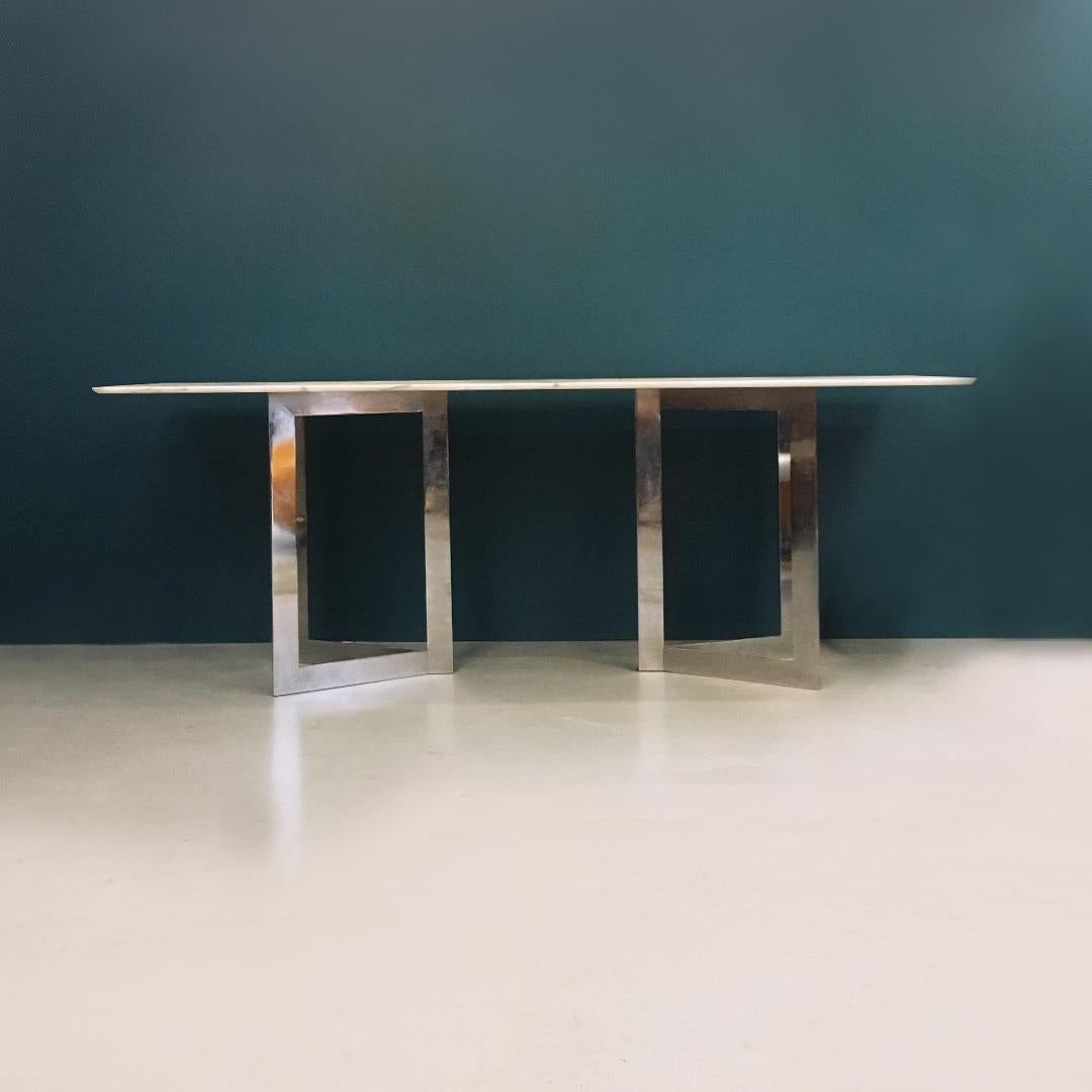 Italian Mid-Century Modern Carrara marble top console, 1970s
Console with Carrara marble top, with gray veins and double base with triangular chromed steel bands section.
It is possible to arrange the two bases in a different way from the one