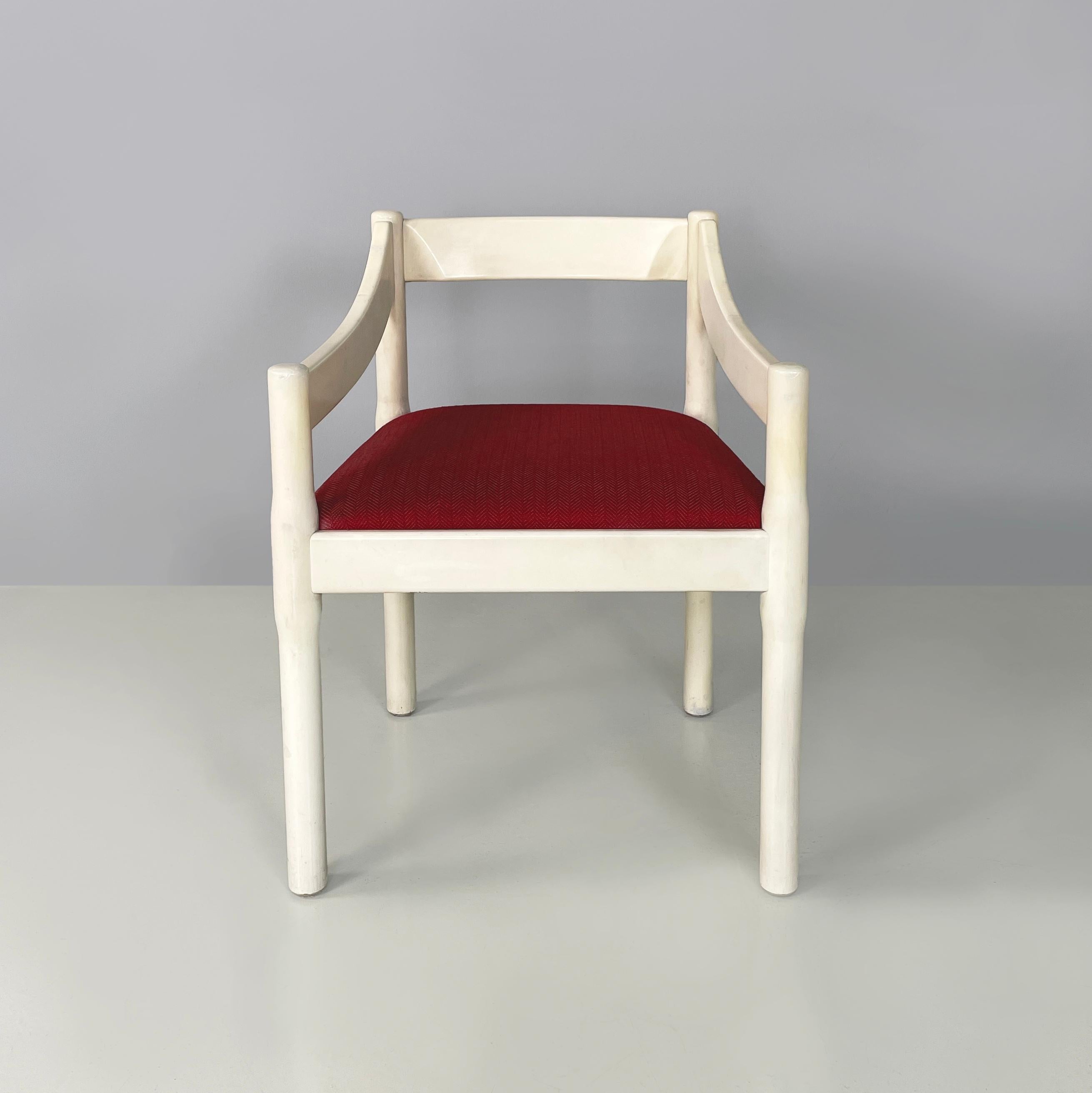 Italian mid-century modern Chair Carimate by Vico Magistretti for Cassina, 1970s
Chair mod. Carimate in white lacquered wood with glossy finish and seat, padded  and covered in red fabric. The armrests and backrest have a rectangular section and