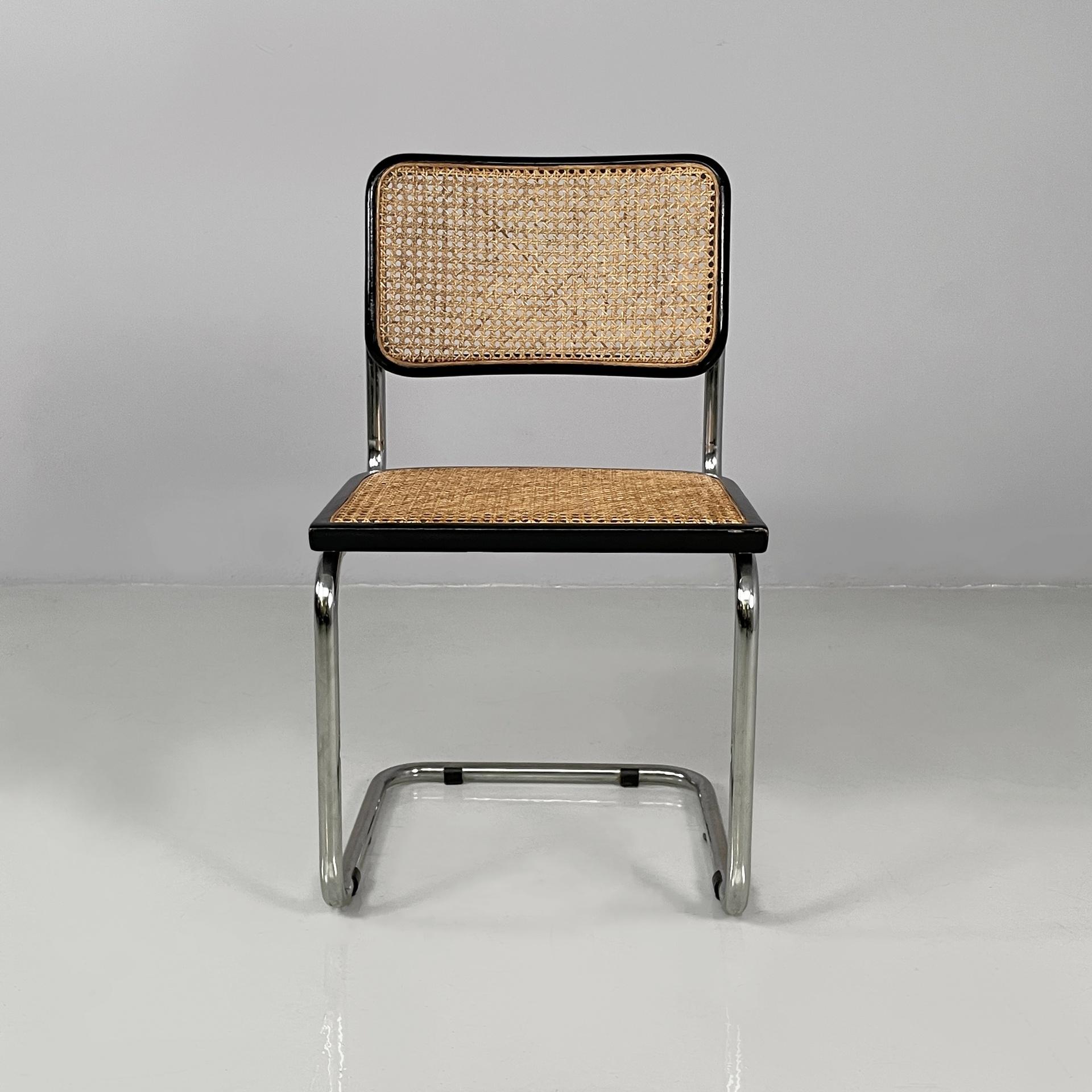 Sedia moderna italiana di metà secolo in legno nero, paglia e acciaio, anni '60
Sedia in stile Cesca con seduta e schienale in paglia di Wood e bordo in legno verniciato nero. La struttura è in acciaio tubolare. Si basa sul design di Marcel