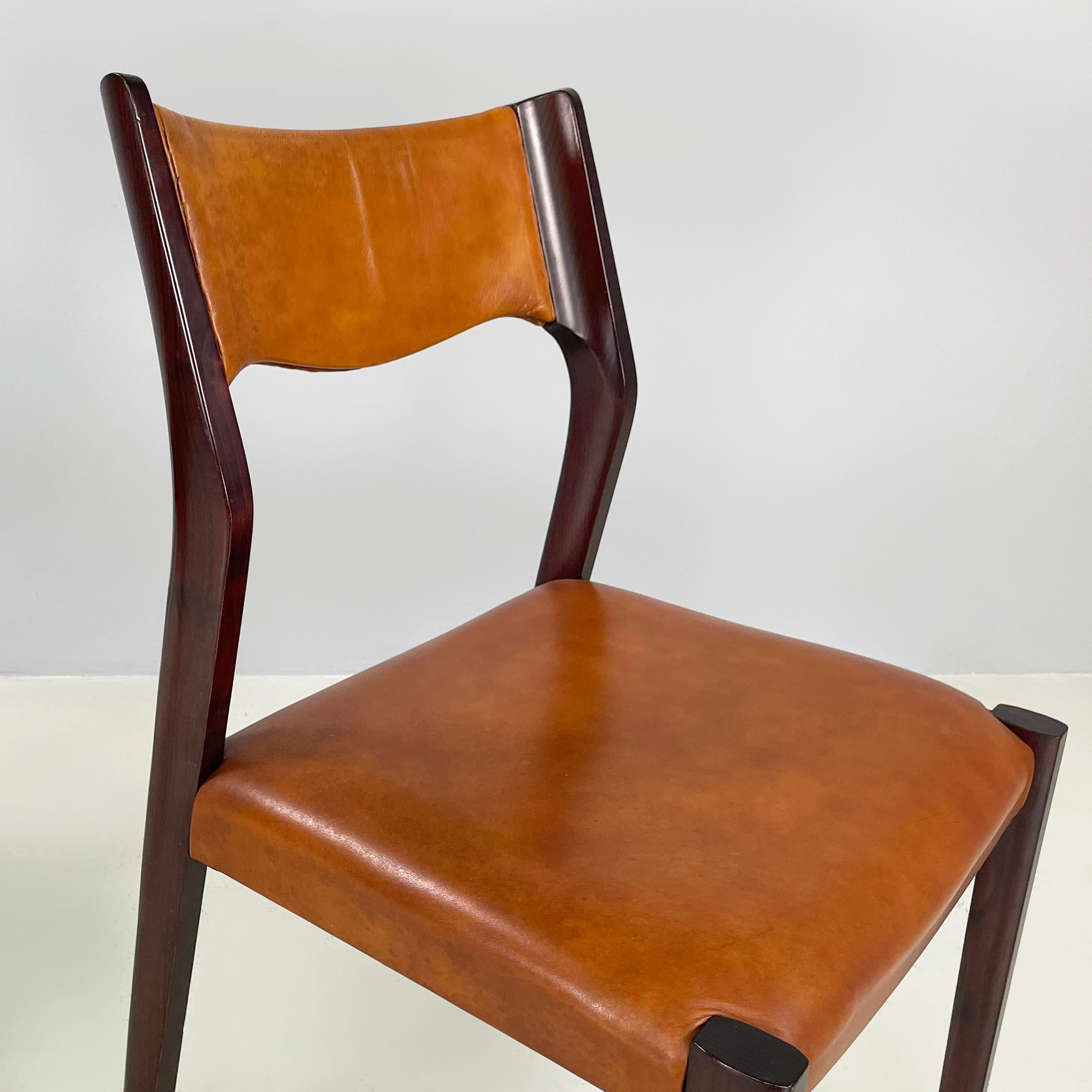 Leather Italian mid-century modern Chair in brown leather and dark wood, 1960s
