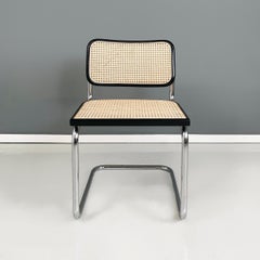 Italian mid-century modern Chair in straw, black wood and curved steel, 1960s