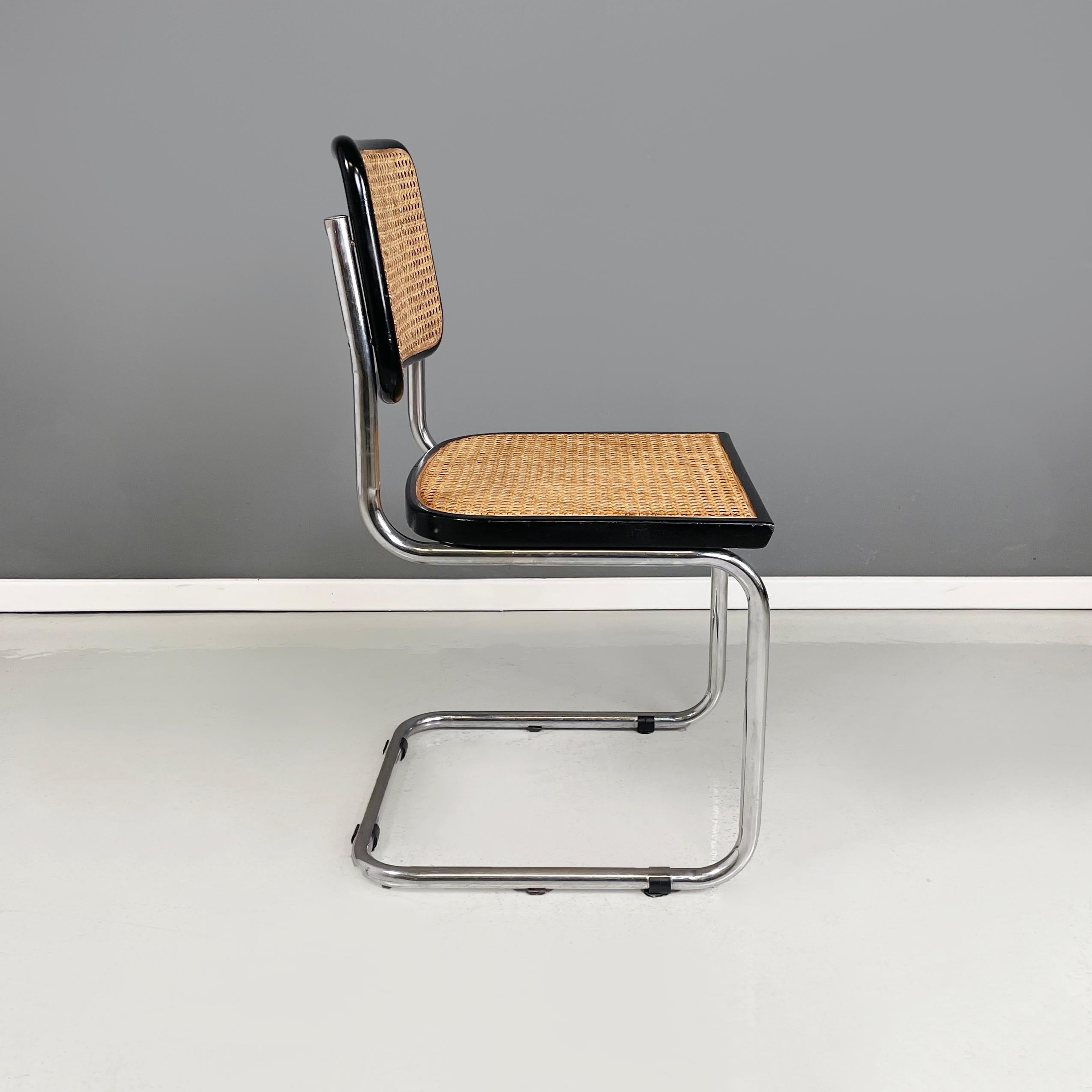 Mid-Century Modern Italian mid-century modern Chair in straw, black wood and curved steel, 1960s For Sale