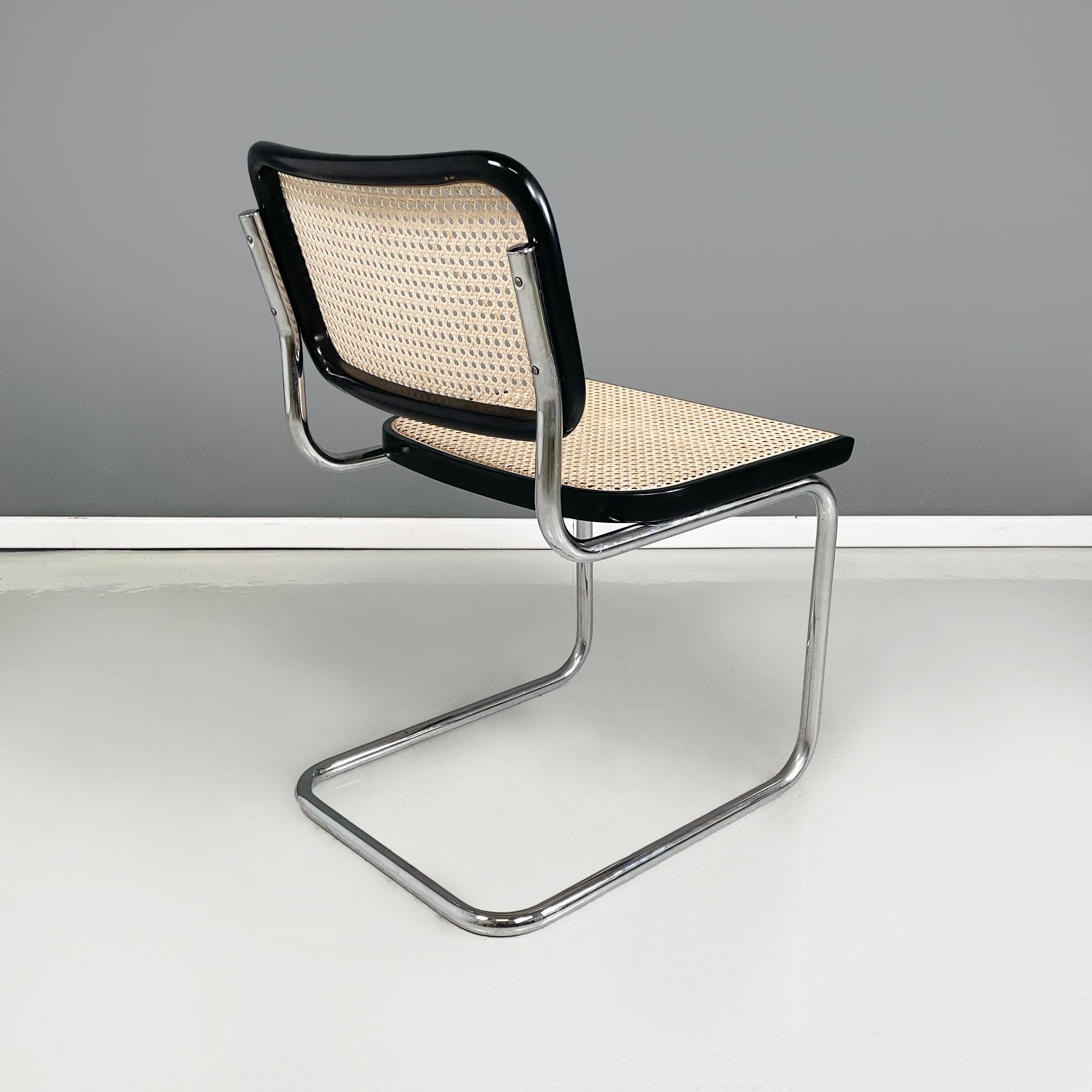 Italian mid-century modern Chair in straw, black wood and curved steel, 1960s In Good Condition For Sale In MIlano, IT