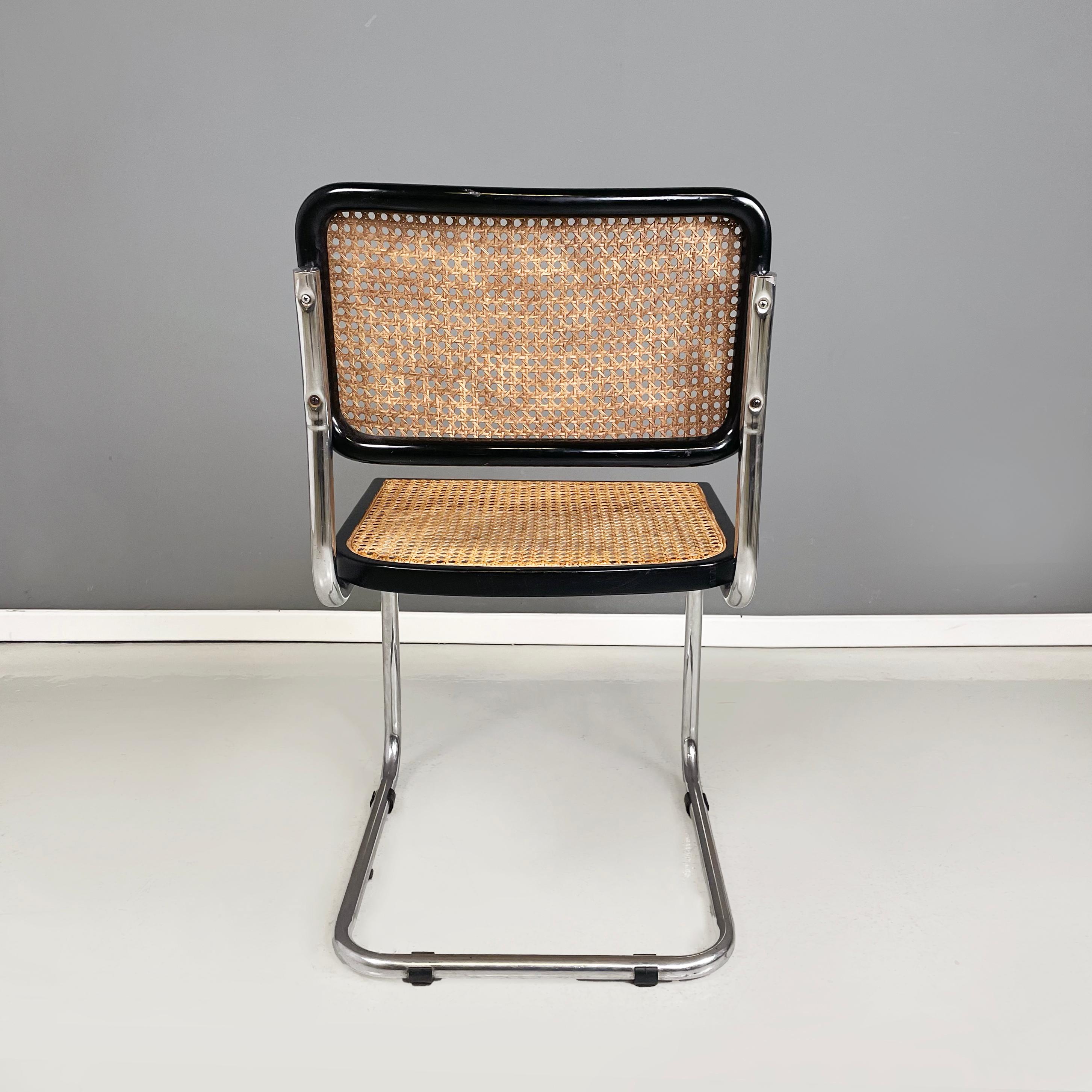 Mid-20th Century Italian mid-century modern Chair in straw, black wood and curved steel, 1960s For Sale