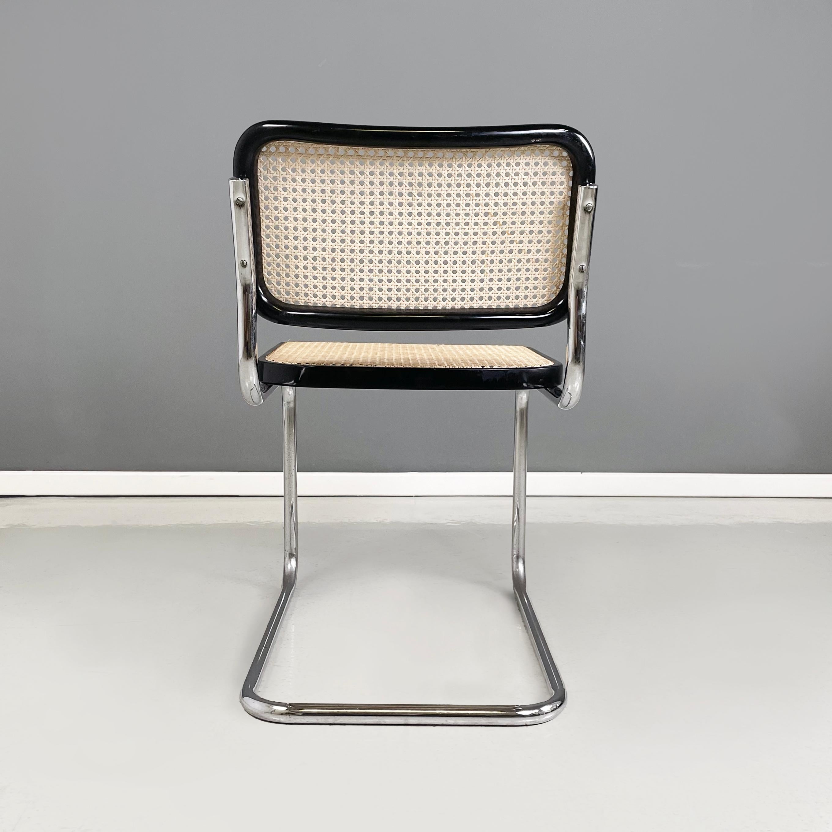 Chaise italienne moderne du milieu du siècle en paille, bois noir et acier courbé, années 1960. Bon état - En vente à MIlano, IT