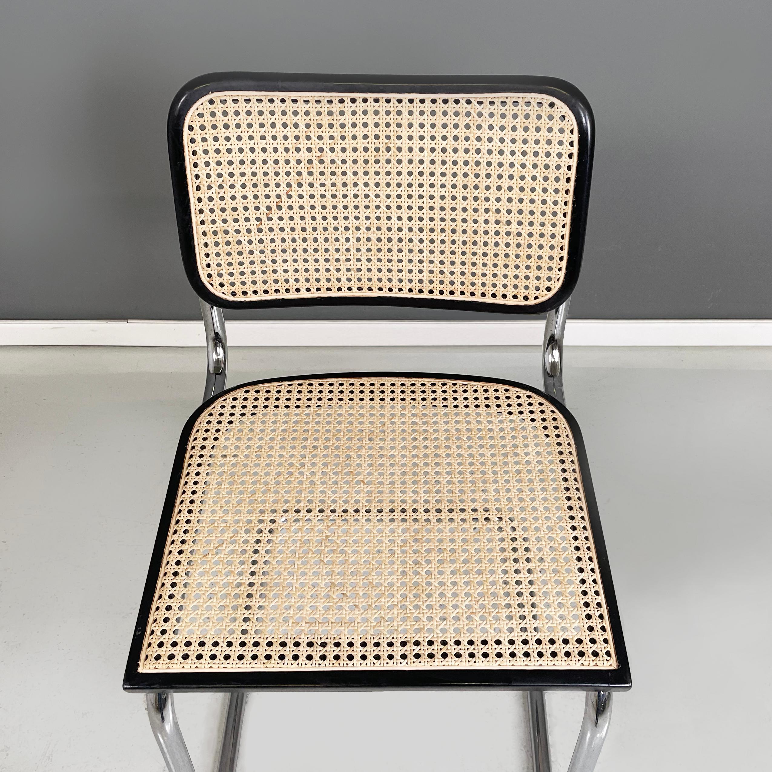 Acier Chaise italienne moderne du milieu du siècle en paille, bois noir et acier courbé, années 1960. en vente