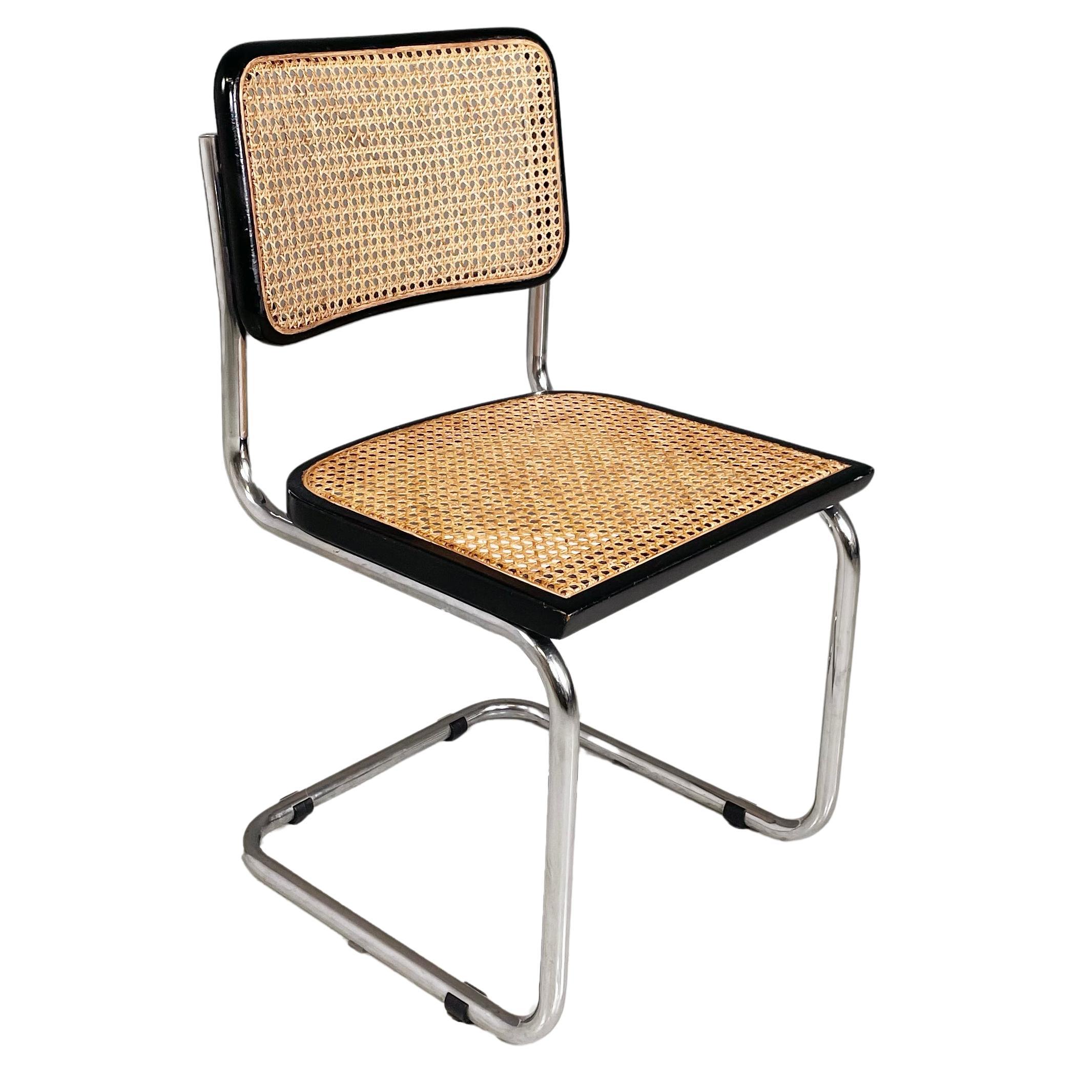 Chaise italienne moderne du milieu du siècle en paille, bois noir et acier courbé, années 1960.