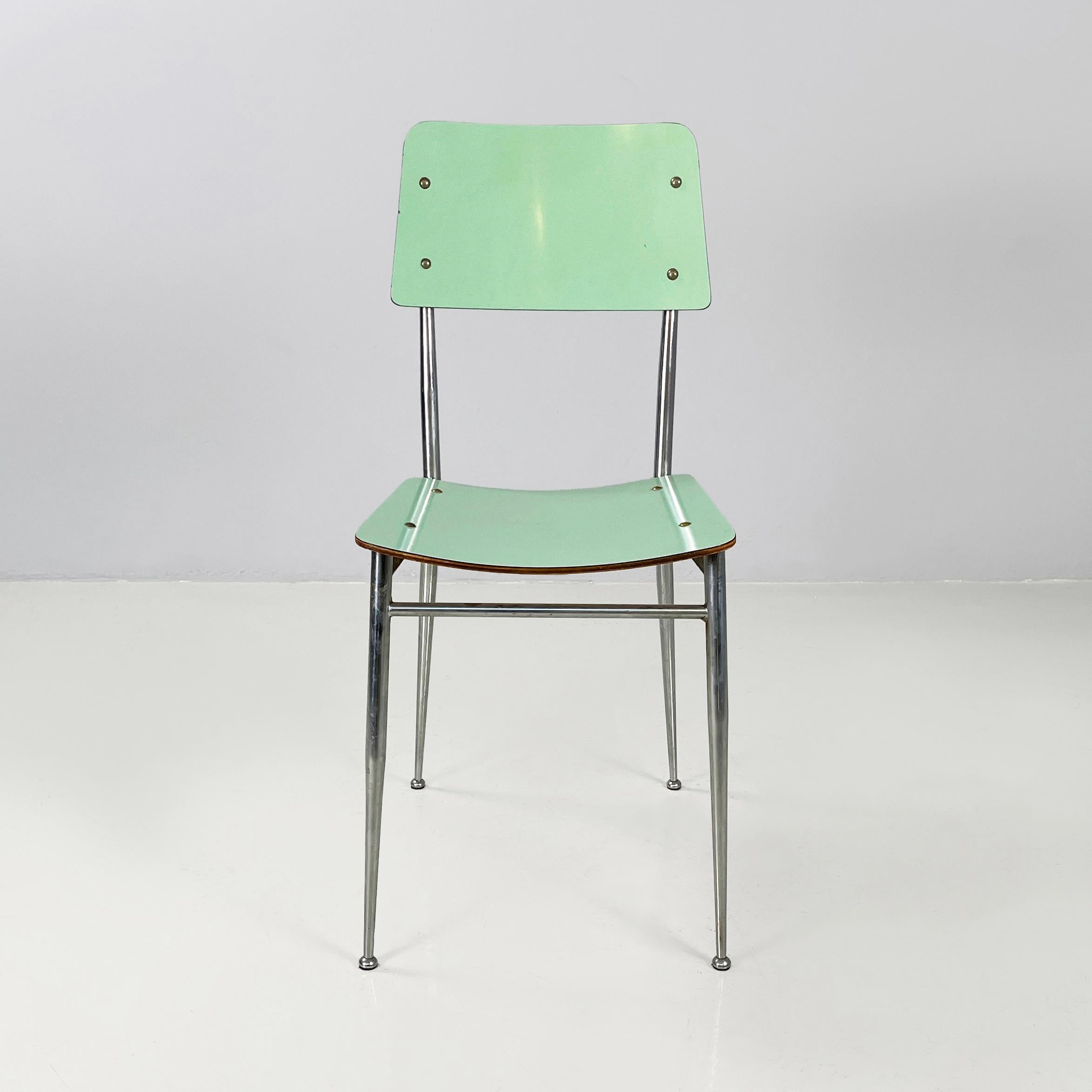 Italian mid-century modern Chairs in aqua green formica and metal, 1960s
Set of 4 chairs with square seat and backrest with rounded corners in light blue-aqua green formica. The metal rod structure has two black painted metal rectangular supports