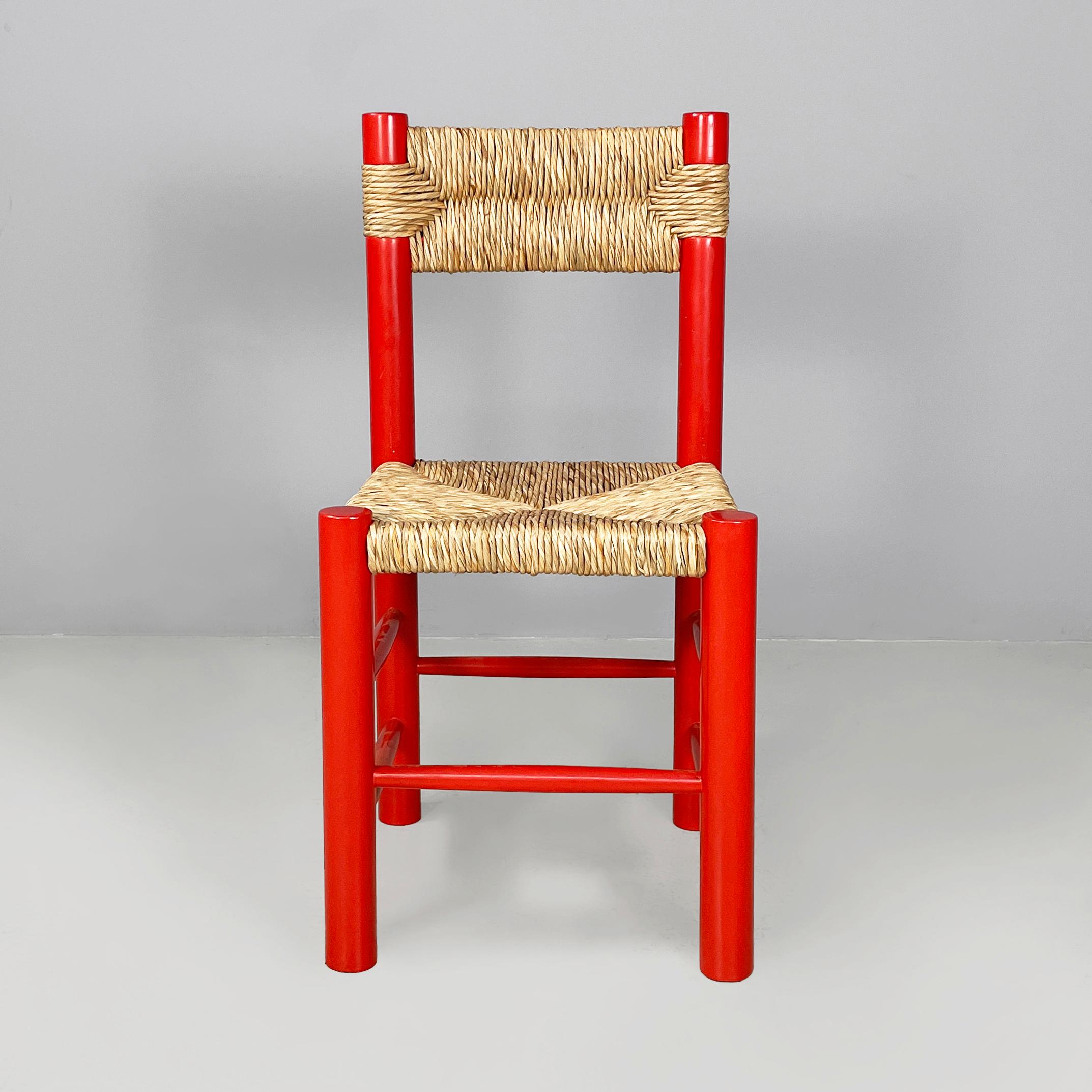 Italian mid-century modern chairs with armrests in red wood and straw, 1970s
Pair of chairs with armrests with squared seat and backrest in woven straw. The structure and legs with round section are in red painted wood.
1970s.
Good condition.