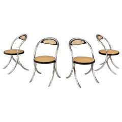 Italian mid-century modern Chairs in straw, black wood and tubular steel, 1970s