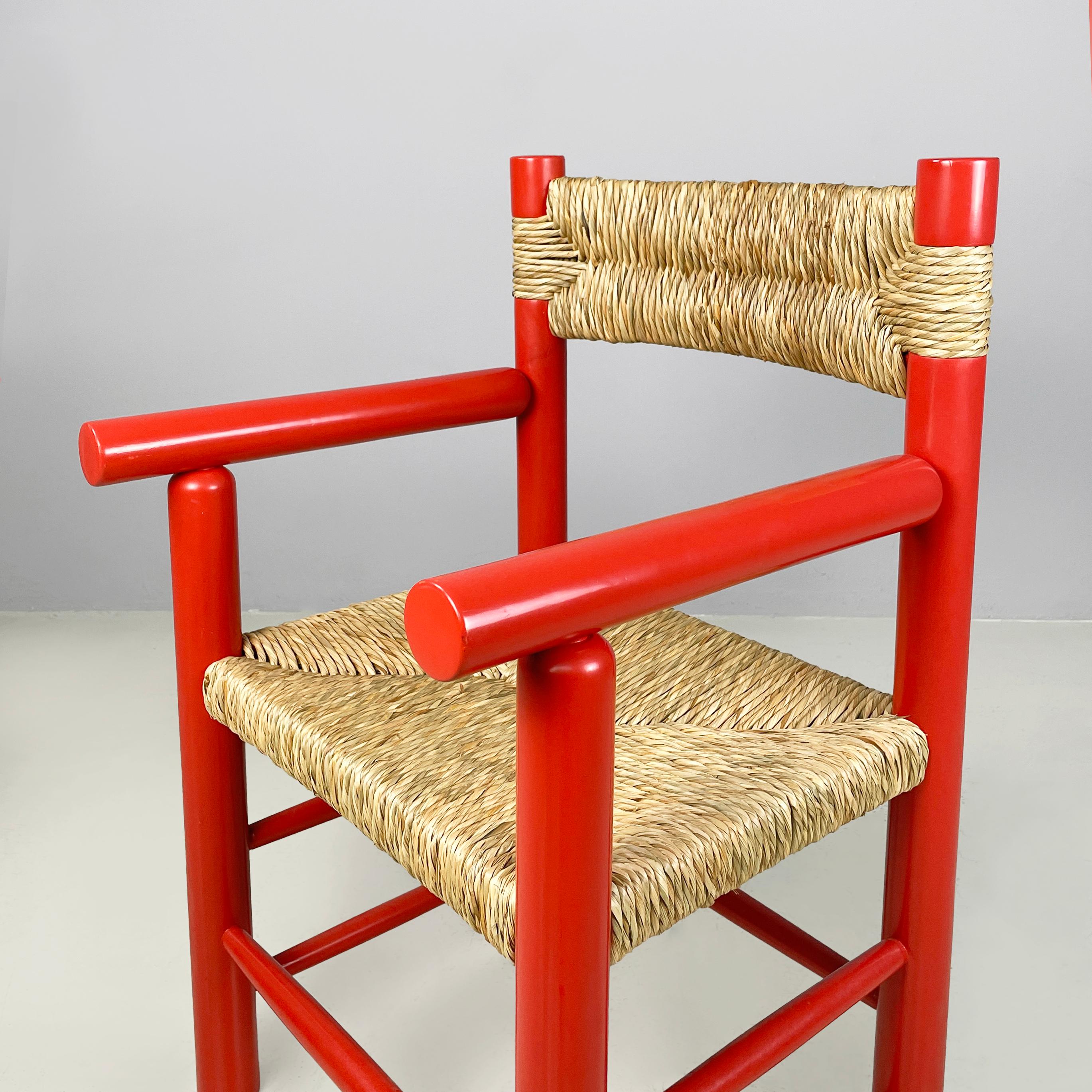 Late 20th Century Italian mid-century modern chairs with armrests in red wood and straw, 1970s For Sale