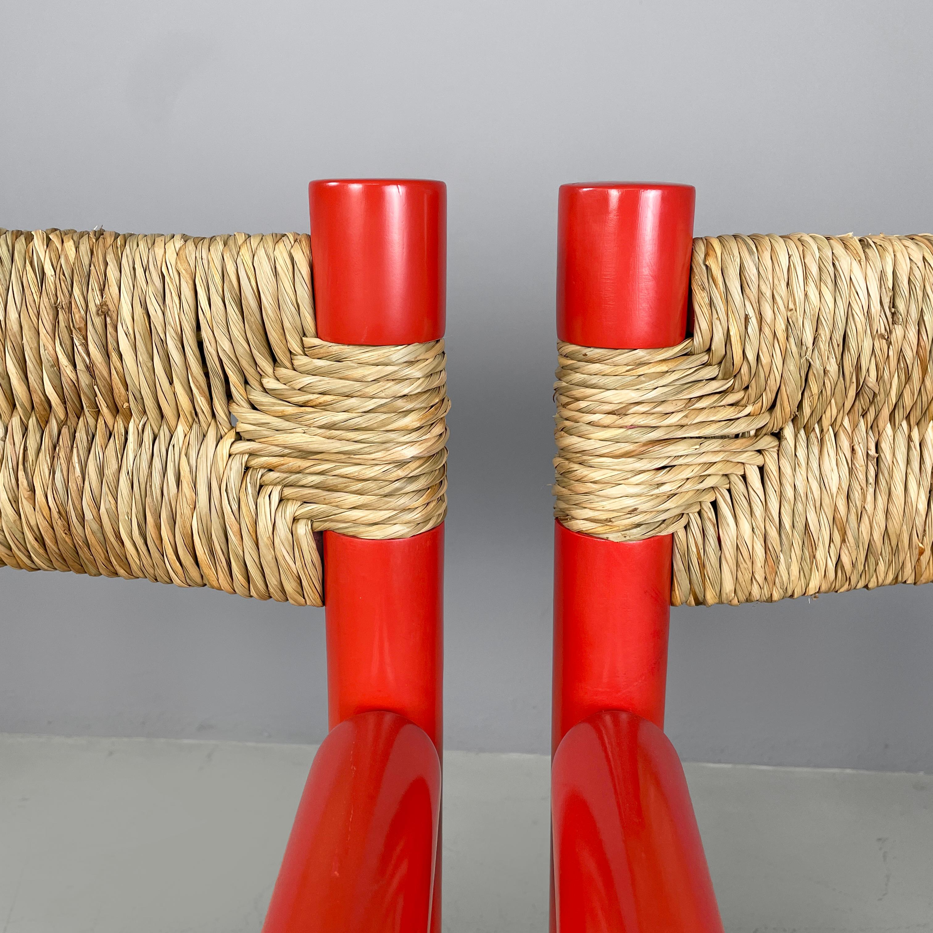Straw Italian mid-century modern chairs with armrests in red wood and straw, 1970s For Sale