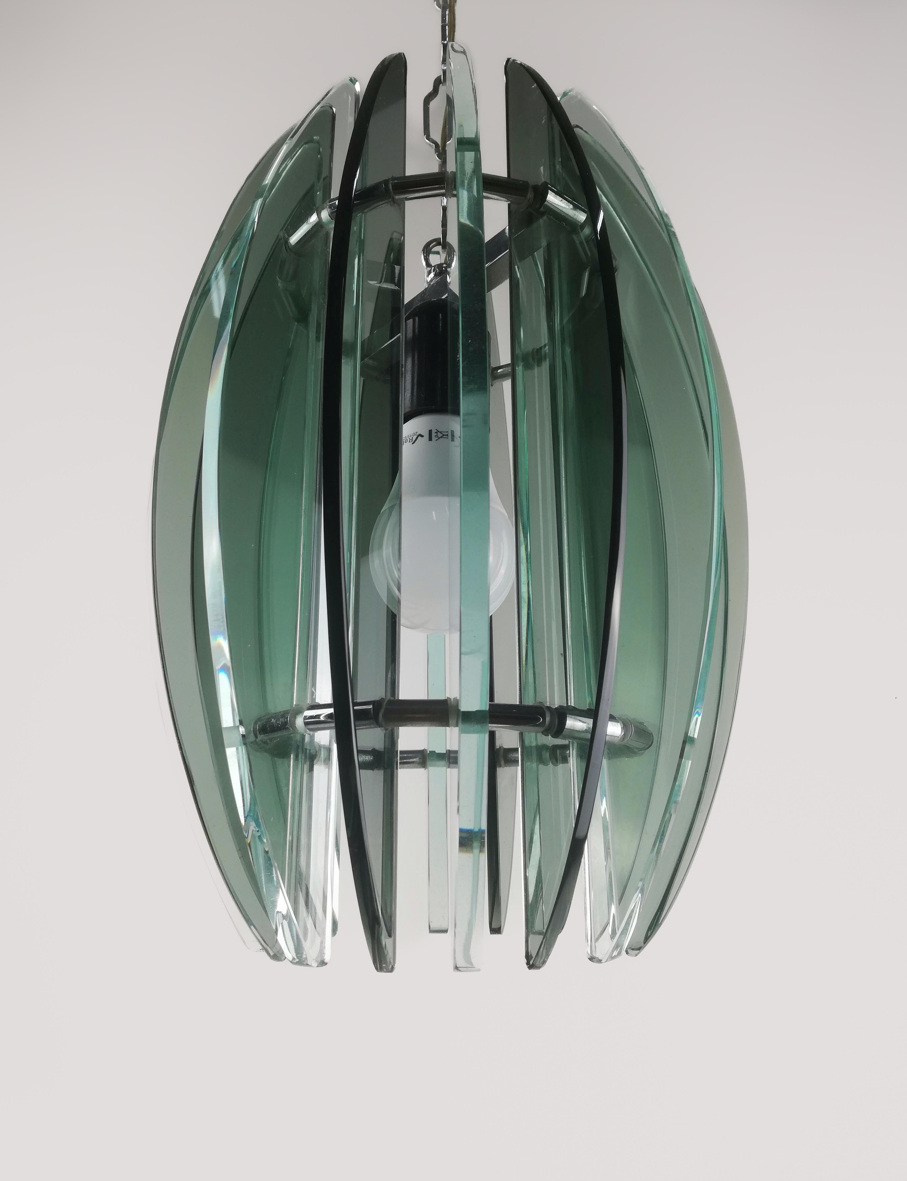 A Mid-Century Modern Suspension chandelier designed by the Historic Italian company 