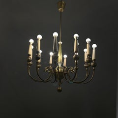 Italian mid-century modern chandelier in brass and white metal, 1950s