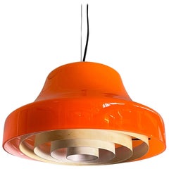 Italian mid-century modern chandelier in orange glass and white metal, 1970s