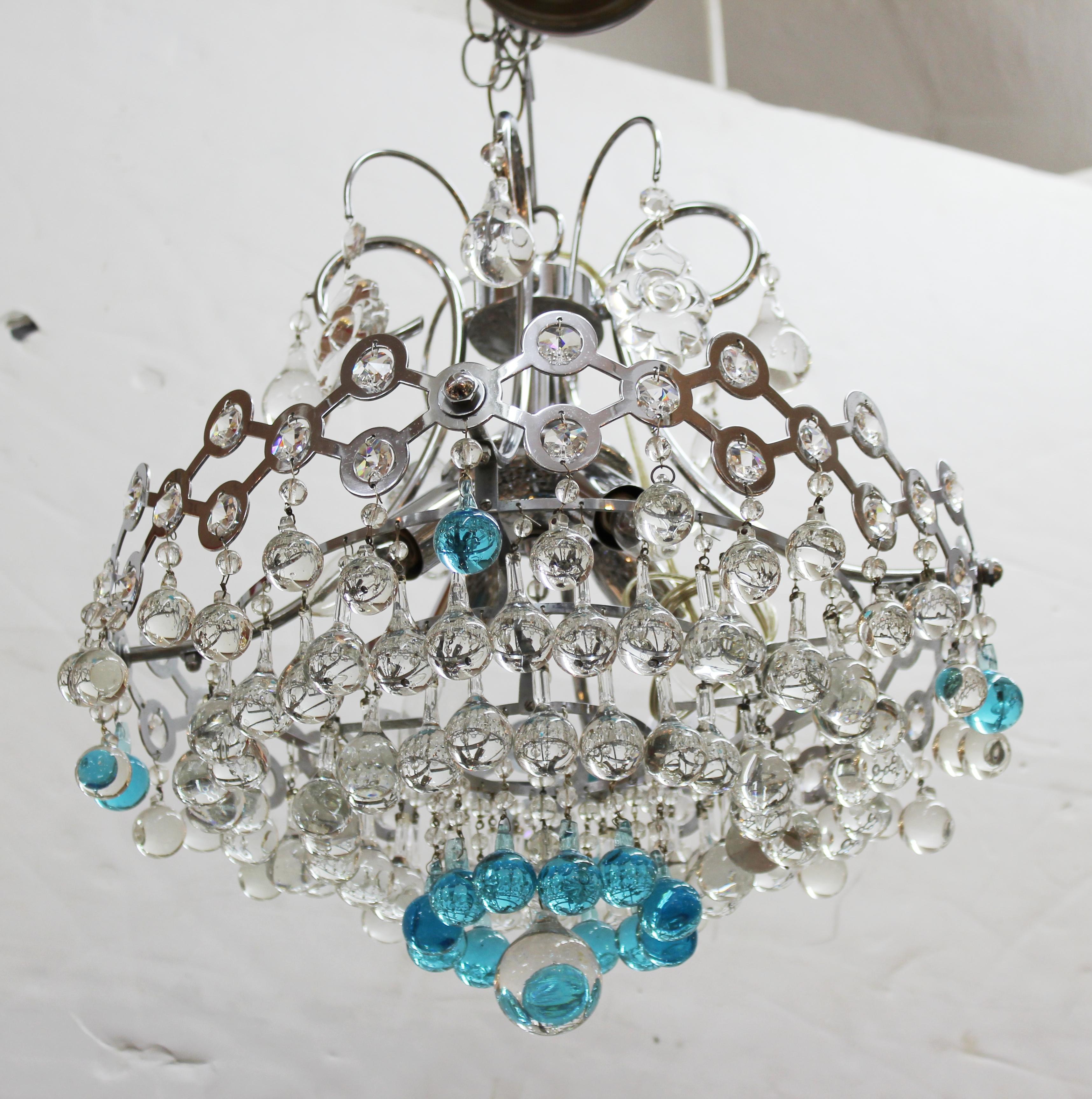 Mid-Century Modern Italian chandelier with chrome structure and handblown hanging clear and turquoise glass balls. The piece has recently been rewired to comply with US standards. In very good vintage condition.