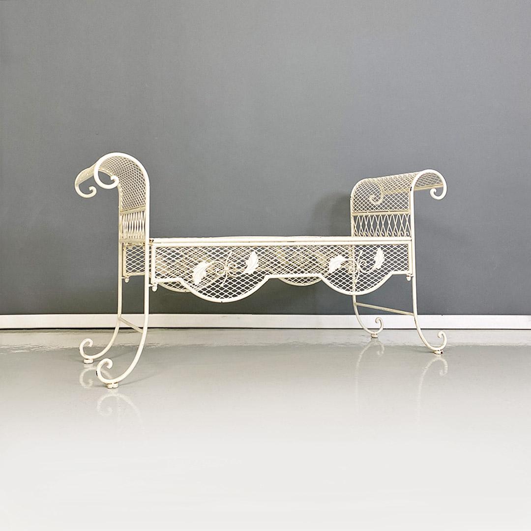 Italian Mid-Century Modern Classic white iron outdoor bench, 1960s
Medium-sized outdoor bench with a Classic design and a very decorative structure entirely in white iron, with curved armrests and legs with curly ends. There are floral decorations