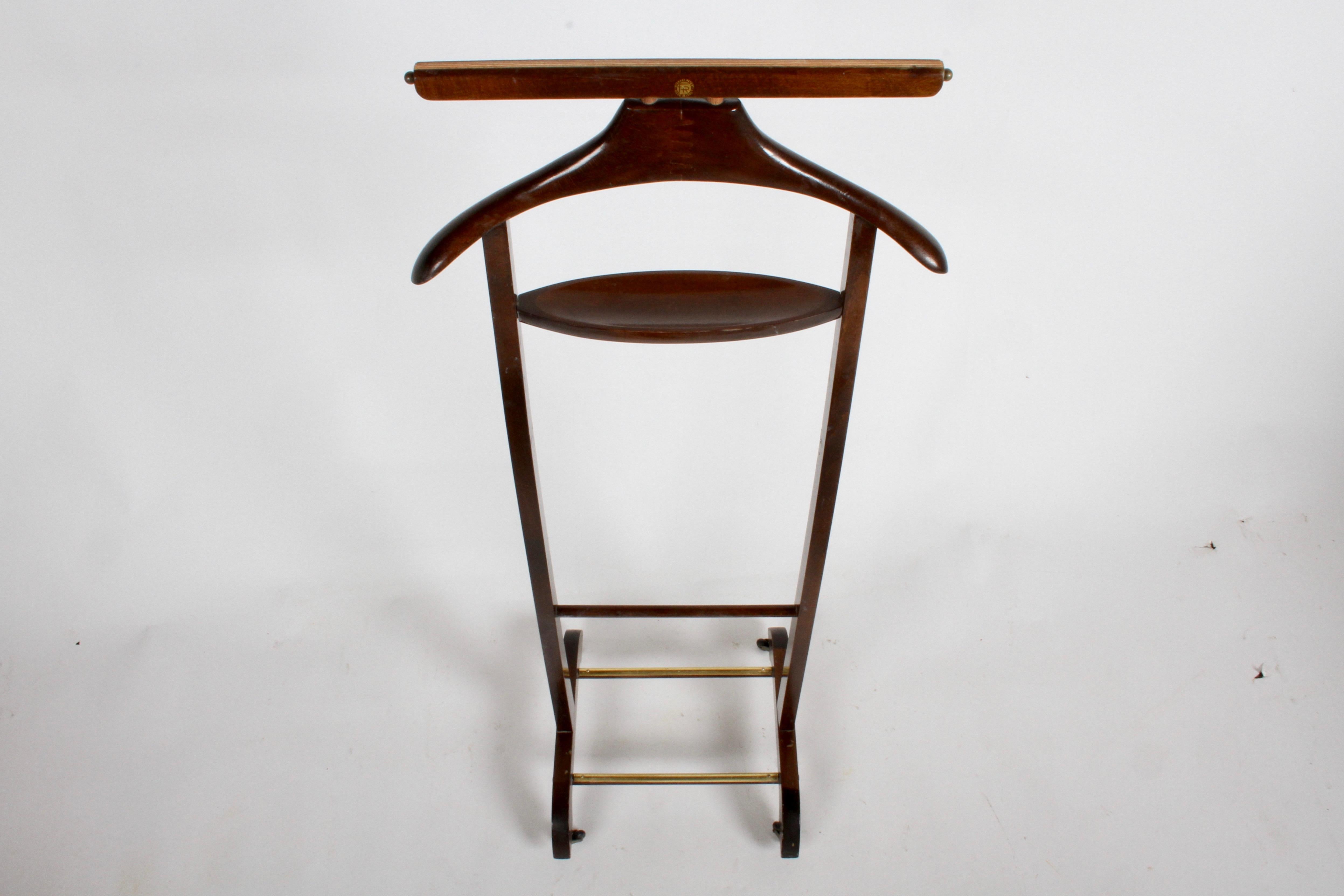 Midcentury clothes valet by Fratelli Reguitti, Italy in the style of Ico Parisi. Beechwood with brass and rubber castors and brass tie holders, original finish.