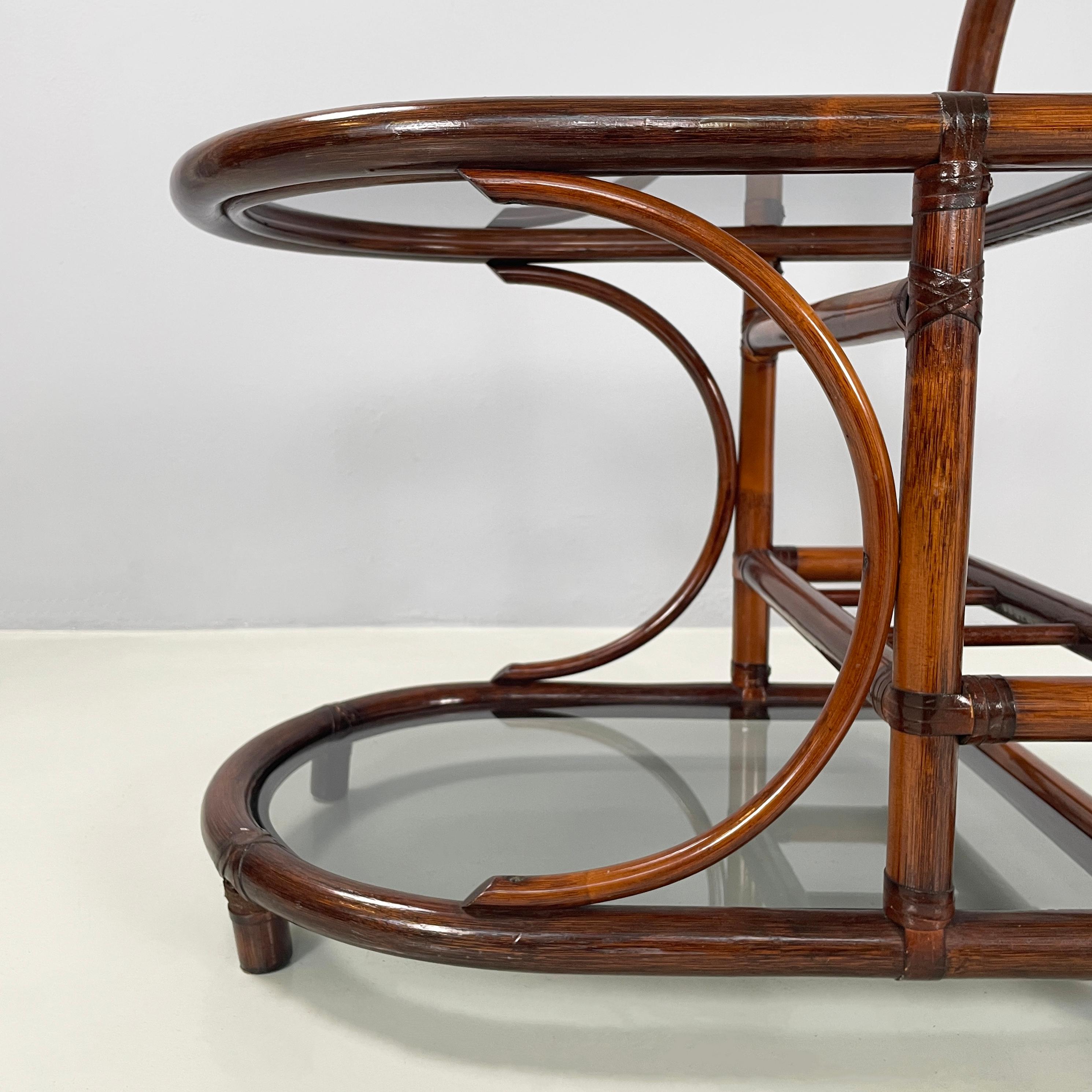 Italian mid-century modern coffee table in smoked glass and dark bamboo, 1960s For Sale 4
