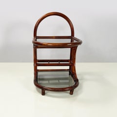 Italian mid-century modern coffee table in smoked glass and dark bamboo, 1960s